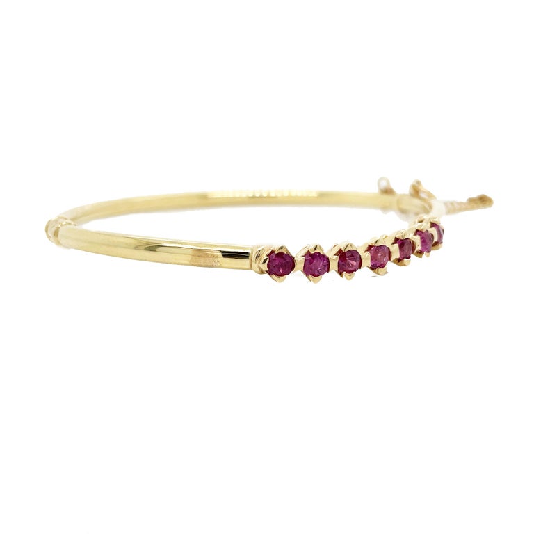 1960s, 14K Yellow Gold Ruby Hinged Bangle For Sale at 1stDibs