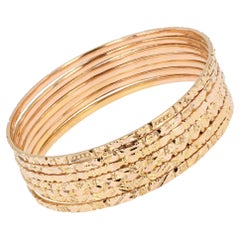 1960s 18 Karat Rose Gold Engraved Weekly Bangle Bracelet