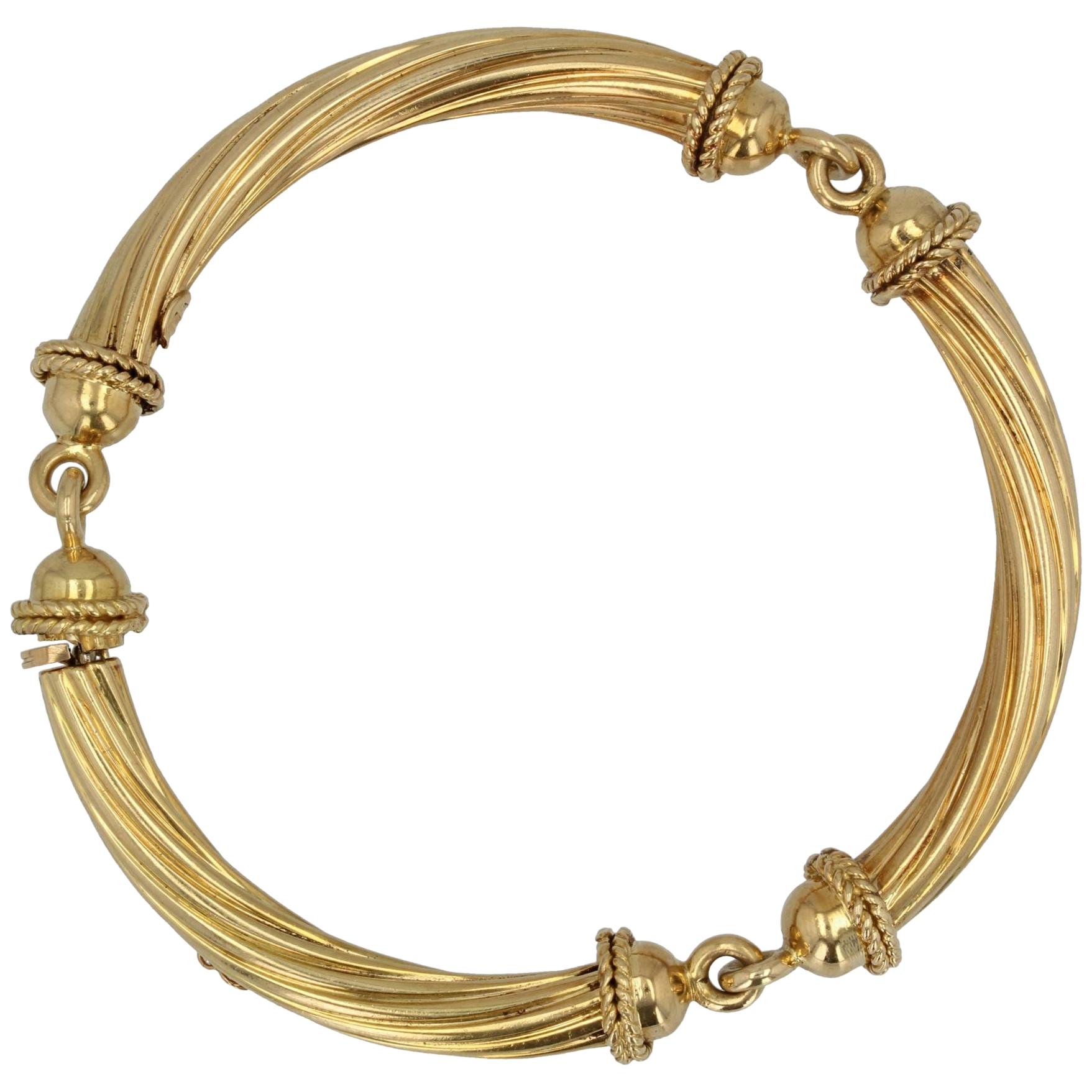 1960s 18 Karat Yellow Gold Articulated Bangle Bracelet For Sale