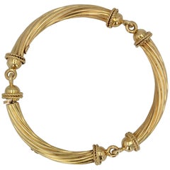 Pulsera articulada de oro amarillo de 18 quilates de los años 60