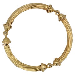 1960s 18 Karat Yellow Gold Articulated Bangle Bracelet