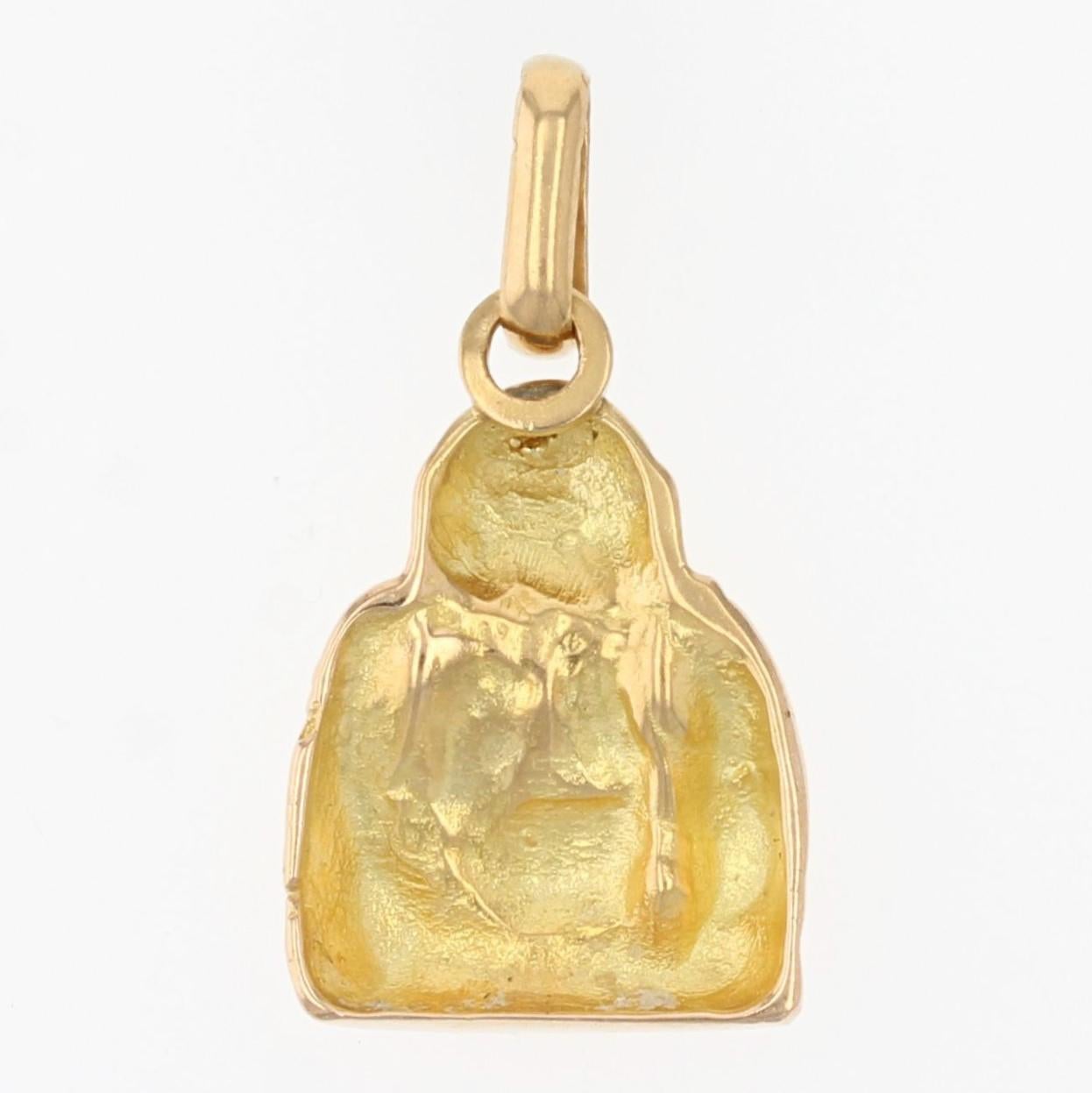 Charm in 18 karat yellow gold.
This retro pendant represents a Buddha.
Height : 2,3 cm, width : 12 mm, thickness : 3,1 mm approximately.
Total weight of the jewel : 2,4 g approximately.
Authentic antique jewel - Work of the 1960s.

Specialized in