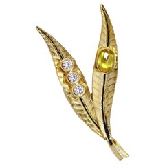 Spilla a doppia foglia in oro giallo 18 carati del 1960