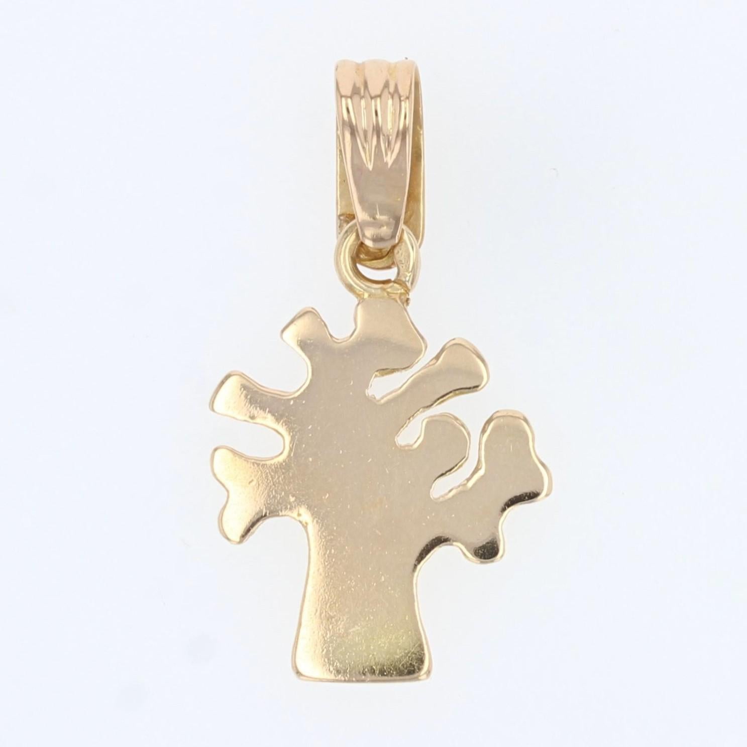 Pendant in 18 karat yellow gold.
This retro pendant represents a tree.
Height : 2,5 cm, width : 19 mm, thickness : 1,7 mm approximately.
Total weight of the jewel : 2,5 g approximately.
Authentic retro jewel - Work of the 1960s.

Specialized in