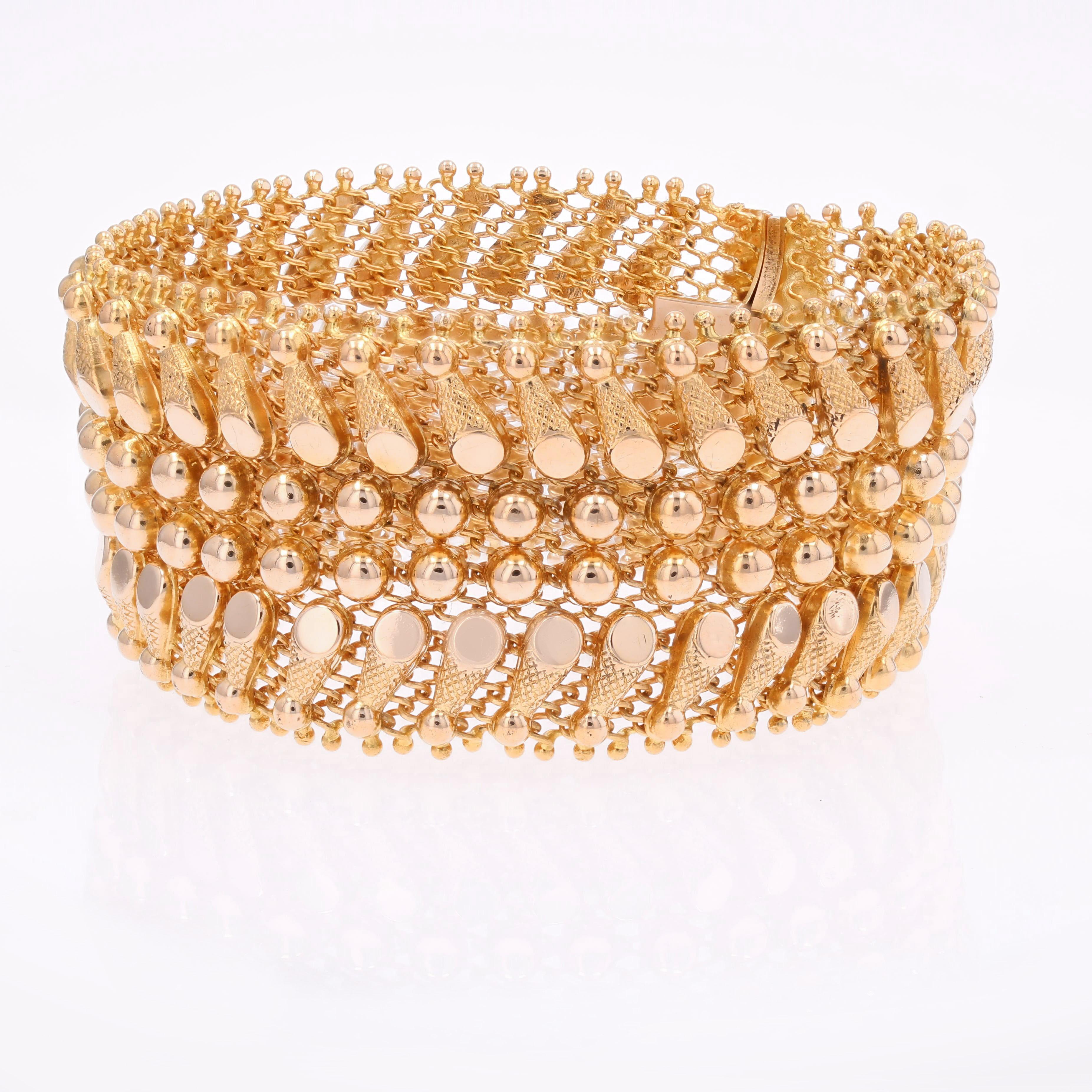 Rétro Bracelet souple en or jaune 18 carats des années 1960 en vente