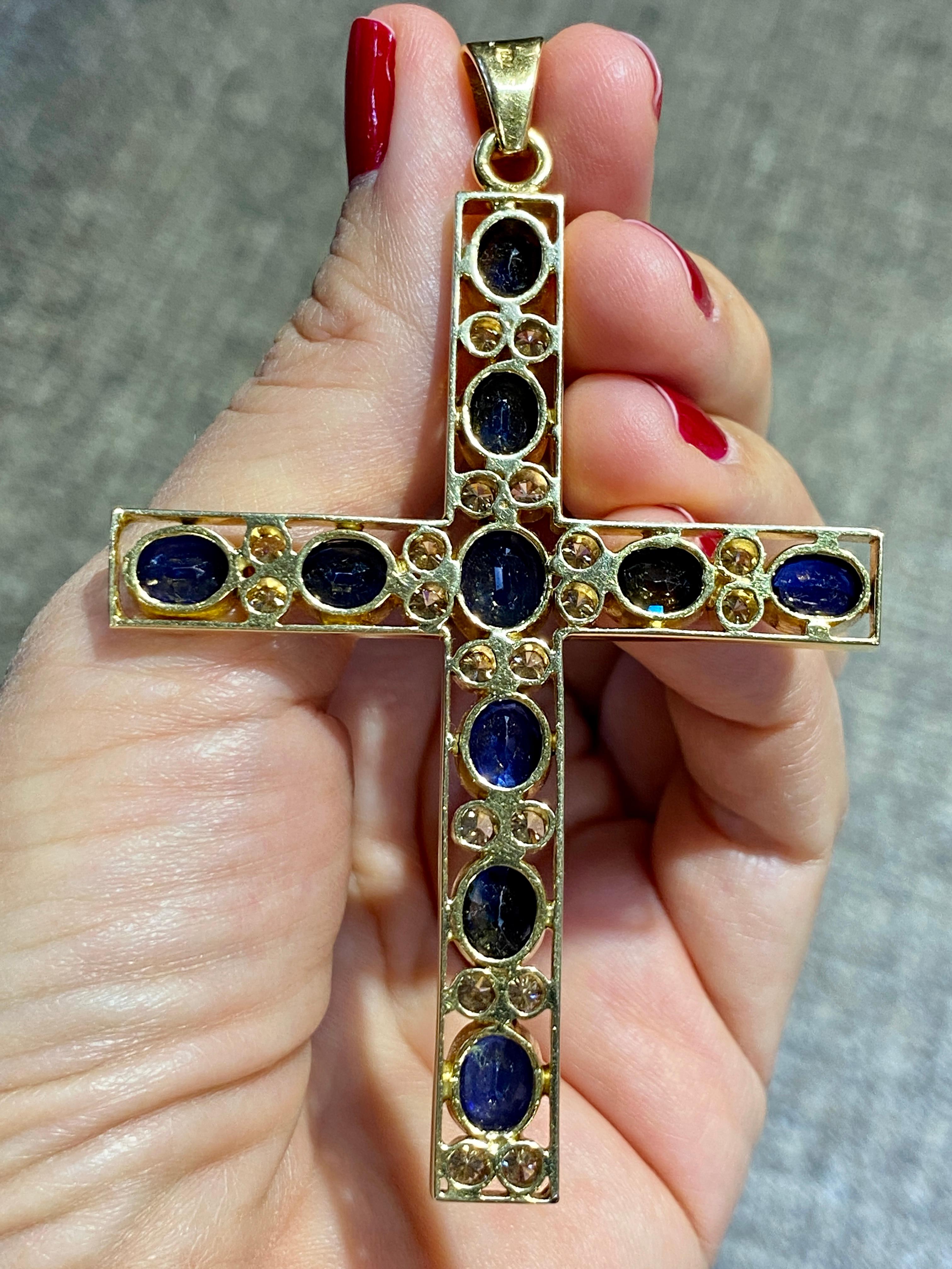 Contemporary 1960s 18k gold cross with 15c oval faceted sapphires and diamonds For Sale