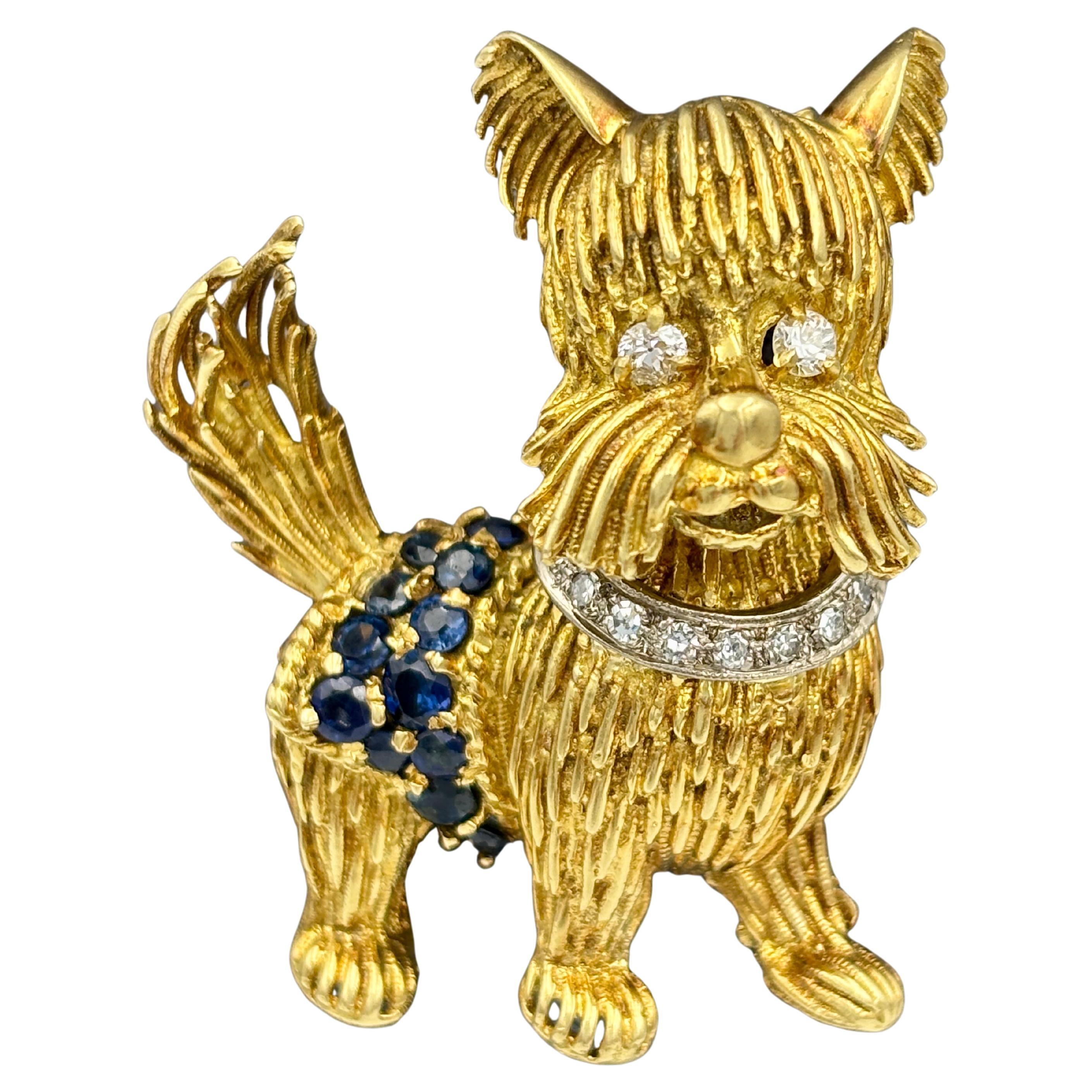 1960s 18k gold dog brooch with diamonds and emeralds