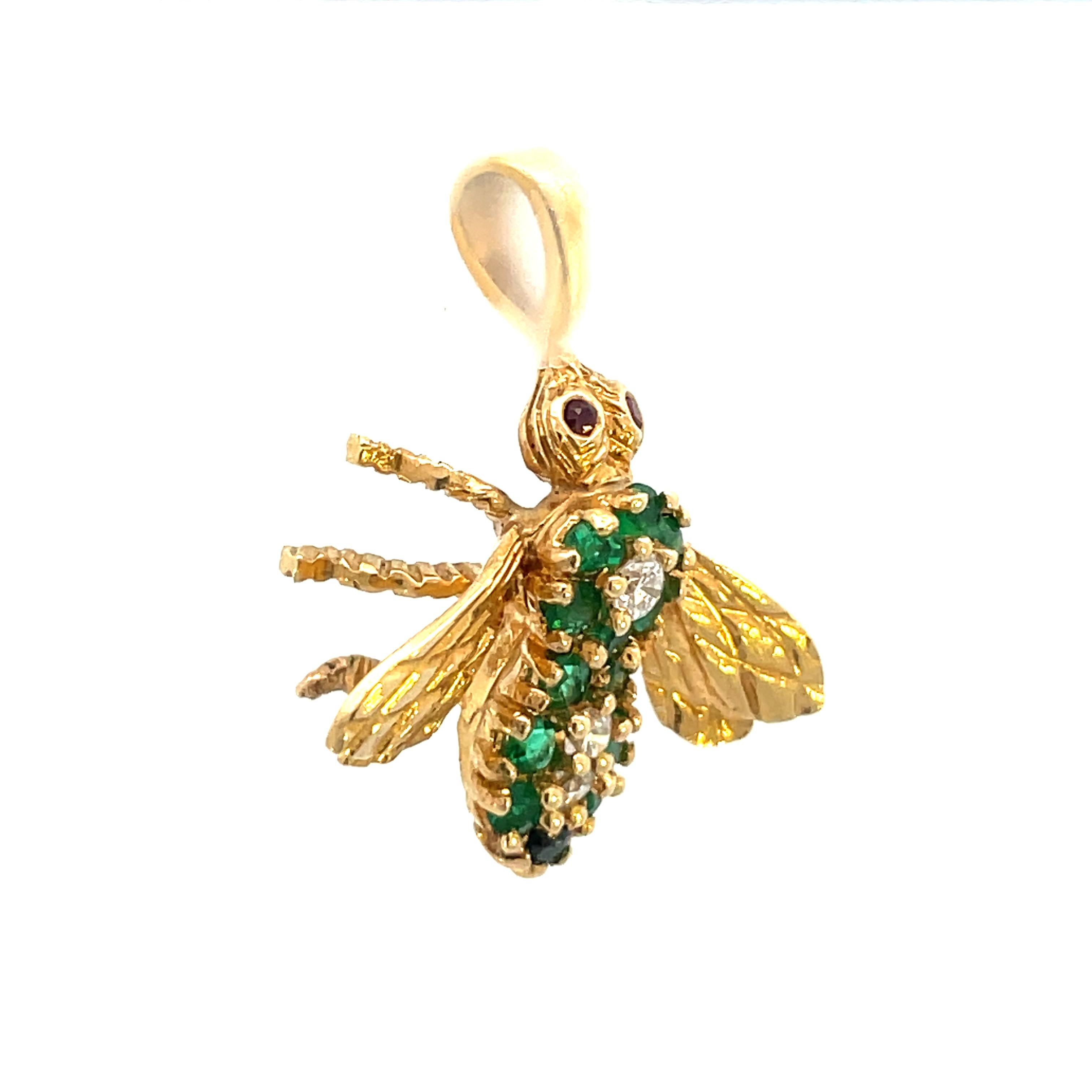 1960s 18K Yellow Gold Herbert Rosenthal Bee Pendant

- 3 = .11 tw round cut H color VS2 clariy diamonds 
- 13 = .26 tw round cut emeralds 
- 2 = .04 tw round cut rubies 
- 18K yellow gold 
- Herbert Rosenthall 
- 3.77 grams 


This is a beautiful