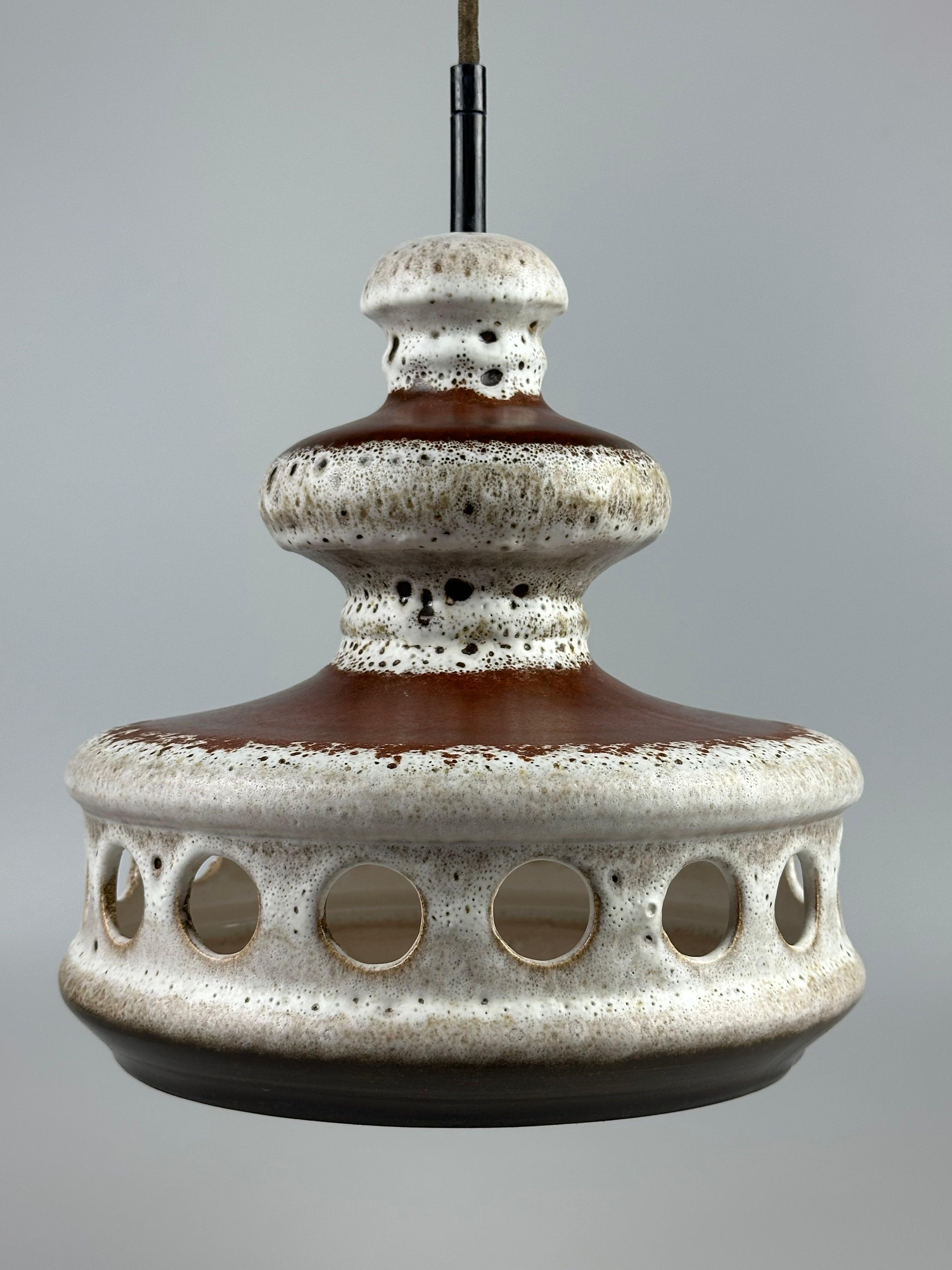 1960s/70s Ceramic Ceiling Lamp, Hanging Lamp, Mid-Century Design

Object: Ceiling Lamp

Manufacturer: Unknown

Condition: Good

Age: Approx. 1960-1970

Dimensions:

Diameter = 26.5cm
Height = 27cm

Other Information:

E-27 Socket

The pictures serve