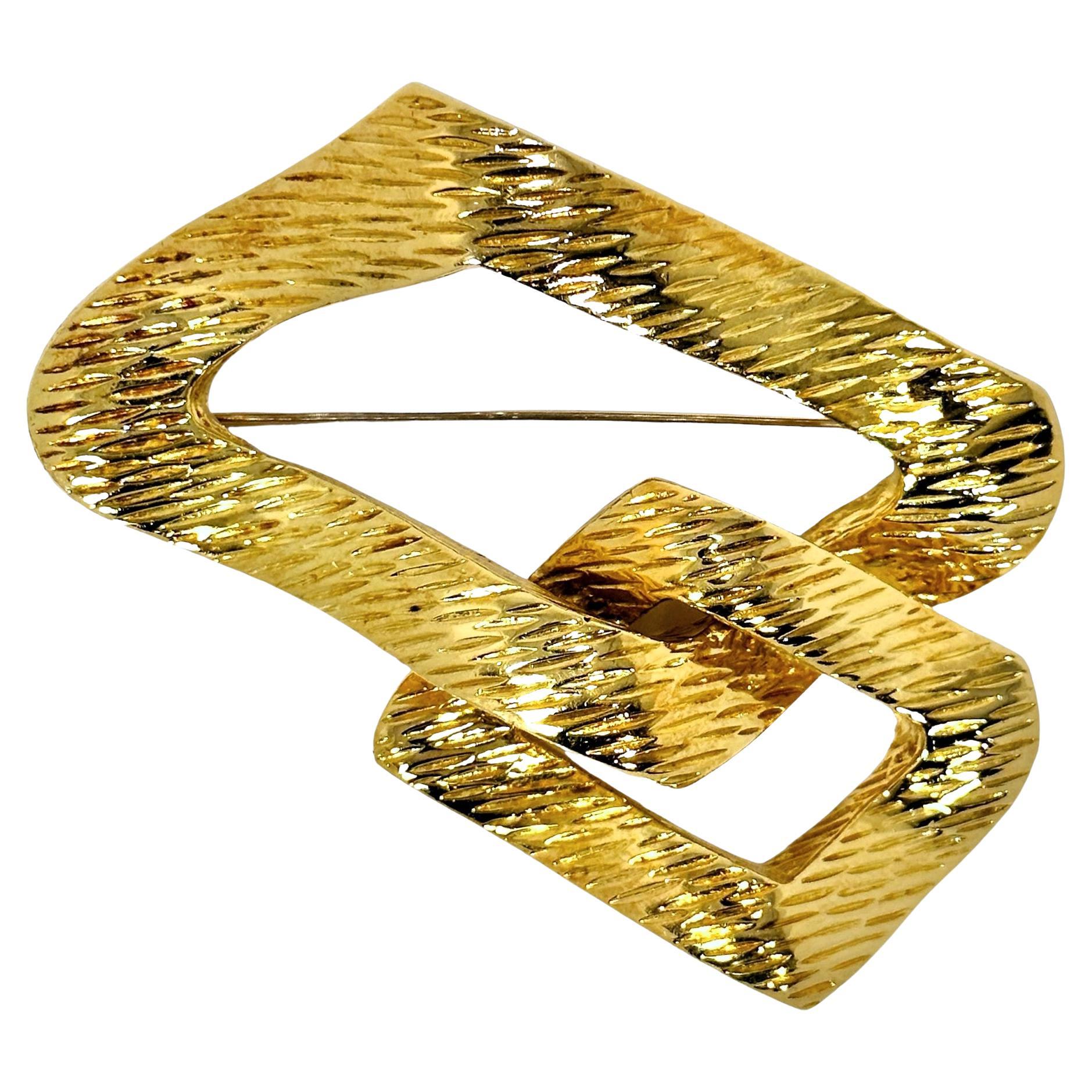 This truly colossal 18k yellow gold Mid-20th Century French Wander designer pendant-brooch is certain to evoke a visceral response in any who see it. At a full 3 1/2 inches in length by 2 3/4 inches in width, it is destined to become a cherished