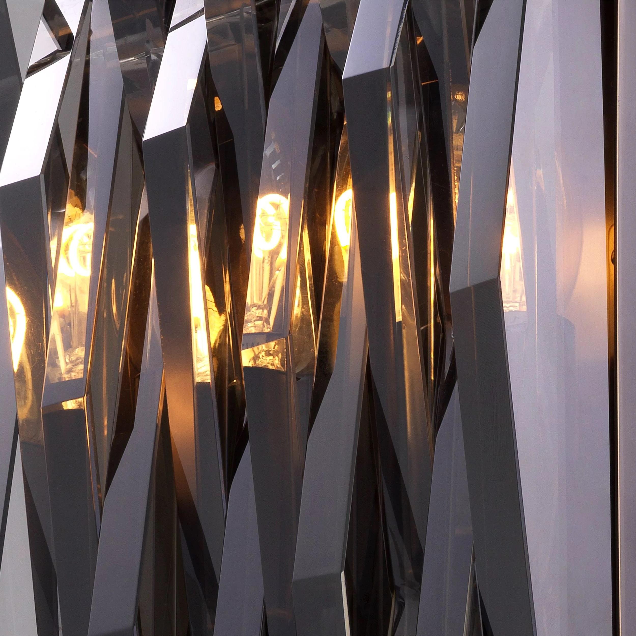 Italian design and Brutalist style large wall light composed of a bronze metal finish base with 11 geometric and graphic glass slices. 4 E14 lightbulbs are required.