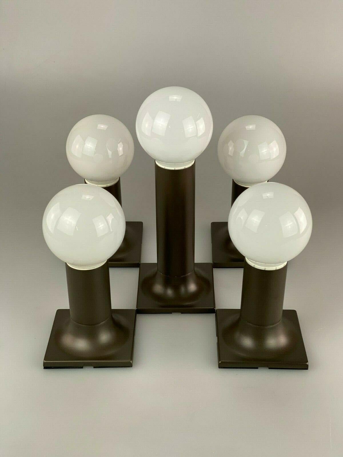 1960s 1970s wall lights tube wall lamps by Rolf Krüger for Staff 60s 70s

Object: Set of 5 wall lamps

Manufacturer: Staff

Condition: good

Age: around 1960-1970

Dimensions:

10.5cm x 10.5cm x 20cm
10.5cm x 10.5cm x 12cm

Other