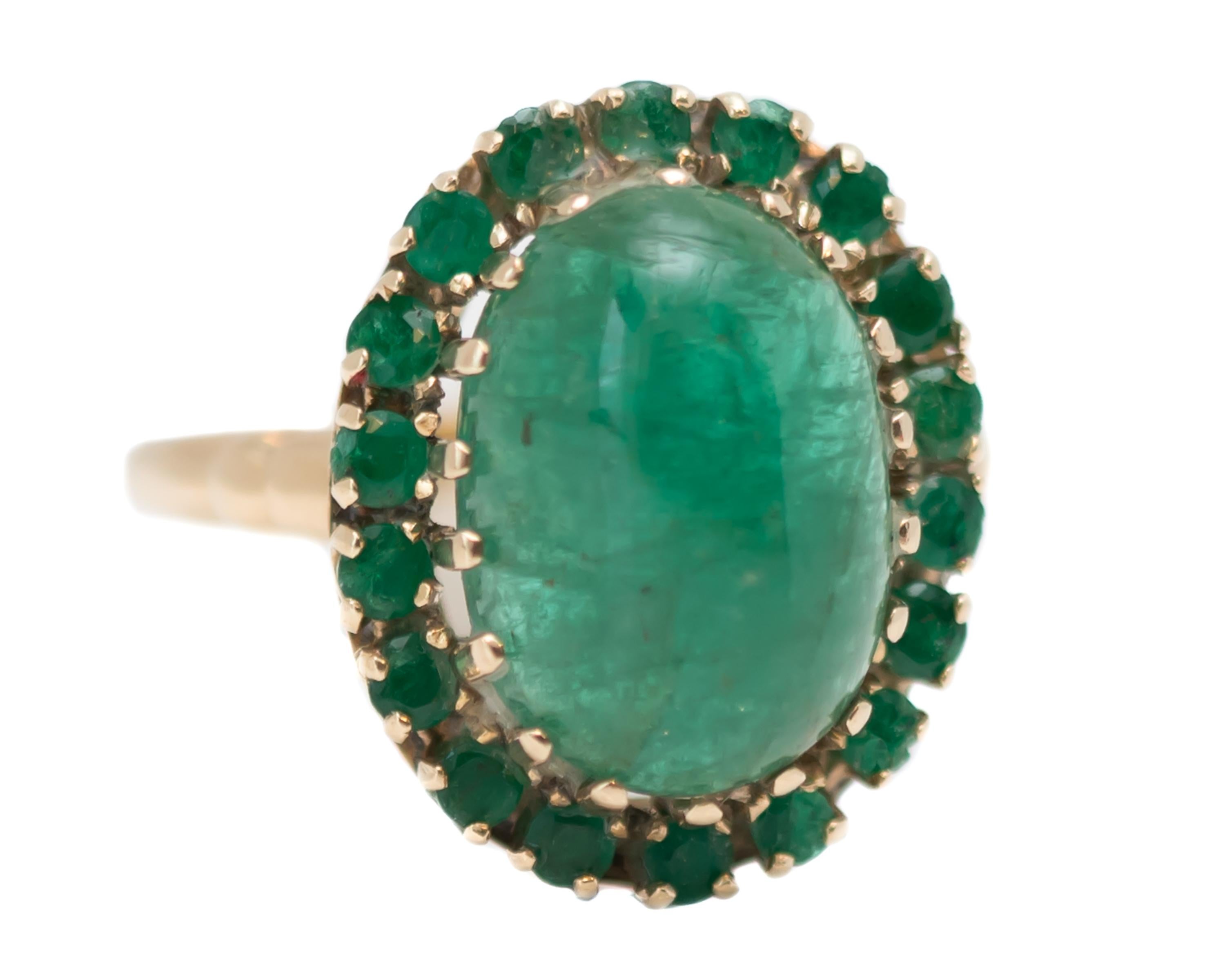 1960s Emerald Cabochon with Emerald Halo Ring - 14 Karat Yellow Gold, Emeralds

Features:
Oval Emerald Cabochon center stone
Emerald Halo
14 Karat Yellow Gold
18-Prong set, Elevated center stone
Prong set side stones

Finger to top of stone measures