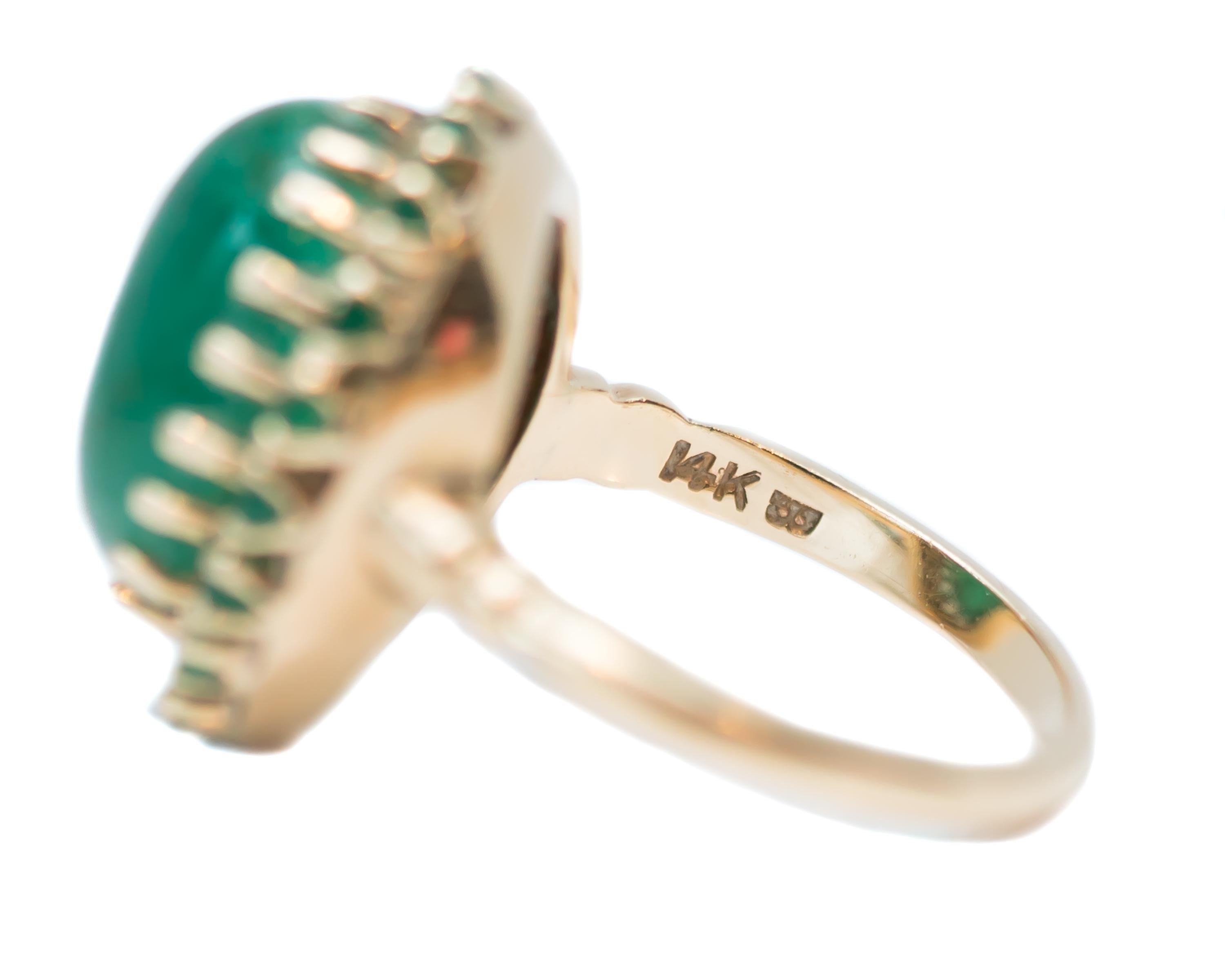 Women's 1960s 5 Carat Total Emerald Cabochon with Halo Ring in 14 Karat Yellow Gold