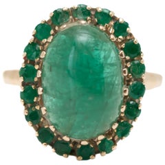 1960s 5 Carat Total Emerald Cabochon with Halo Ring in 14 Karat Yellow Gold