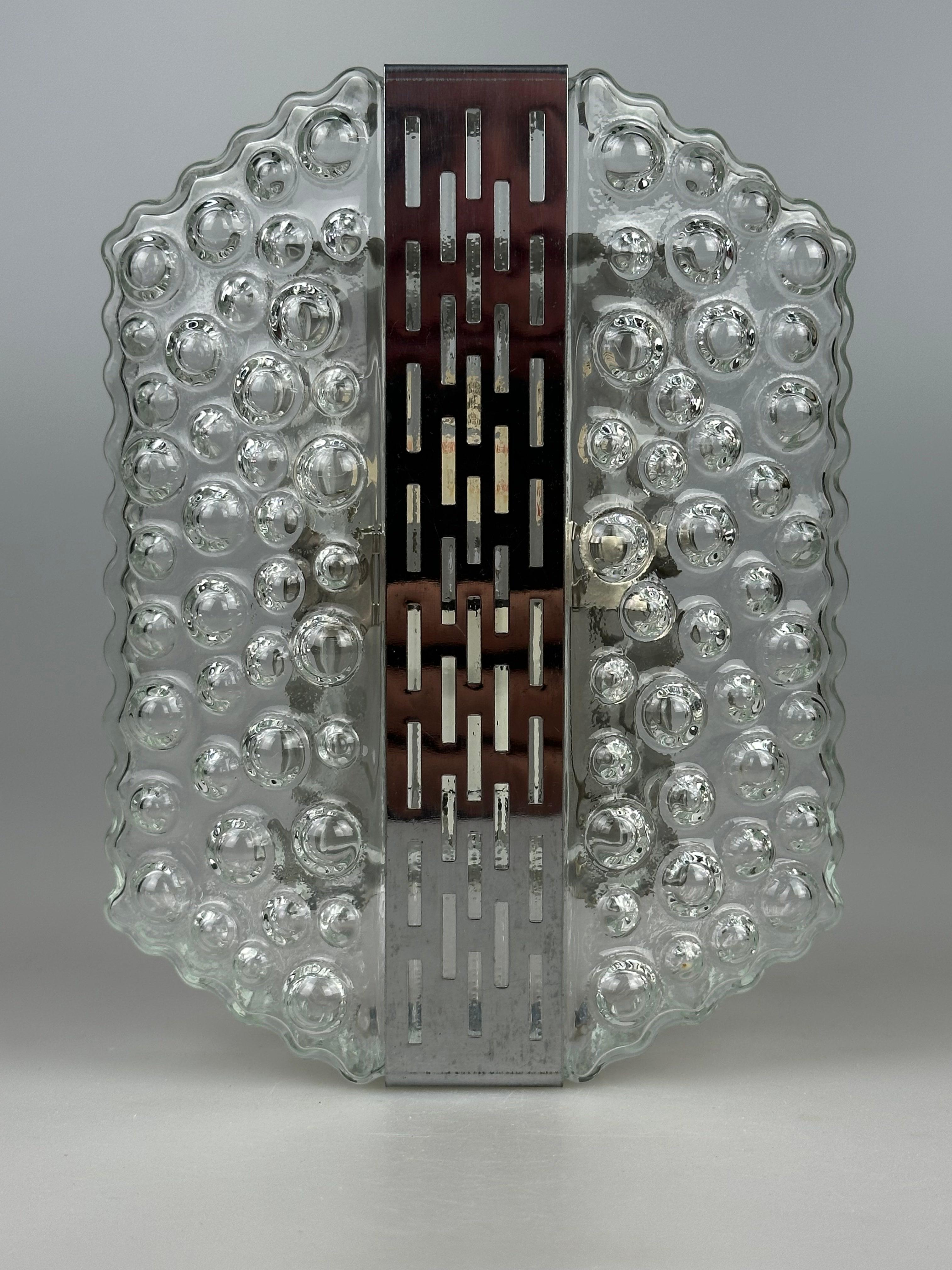 Lámpara de Pared Burbuja, Cromo y Cristal, Años 60/70, Space Age by Hustadt Leuchten

Objeto: Lámpara de pared

Fabricante: Hustadt Leuchten

Estado: Bueno

Edad: Aprox. 1960-1970

Dimensiones:

Altura = 18 cm
Anchura = 14 cm
Profundidad = 6,5