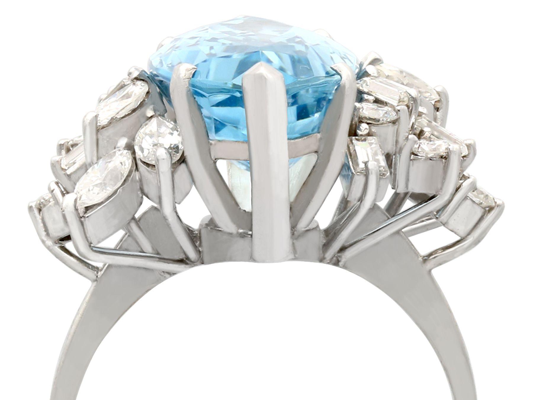 A stunning vintage 8.54 carat aquamarine and 1.66 carat diamond, 15 karat white gold cocktail ring; part of our diverse gemstone jewelry and estate jewelry collections.

This stunning, fine and impressive vintage aquamarine ring has been crafted in