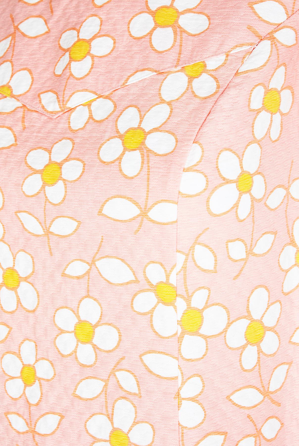 I picked this wonderful original 1960s A-line dress up on my travels to the south of France. It’s certainly got the look of Courreges about it, with its graphic yellow and white floral daisy print pattern against a bright peach background. The