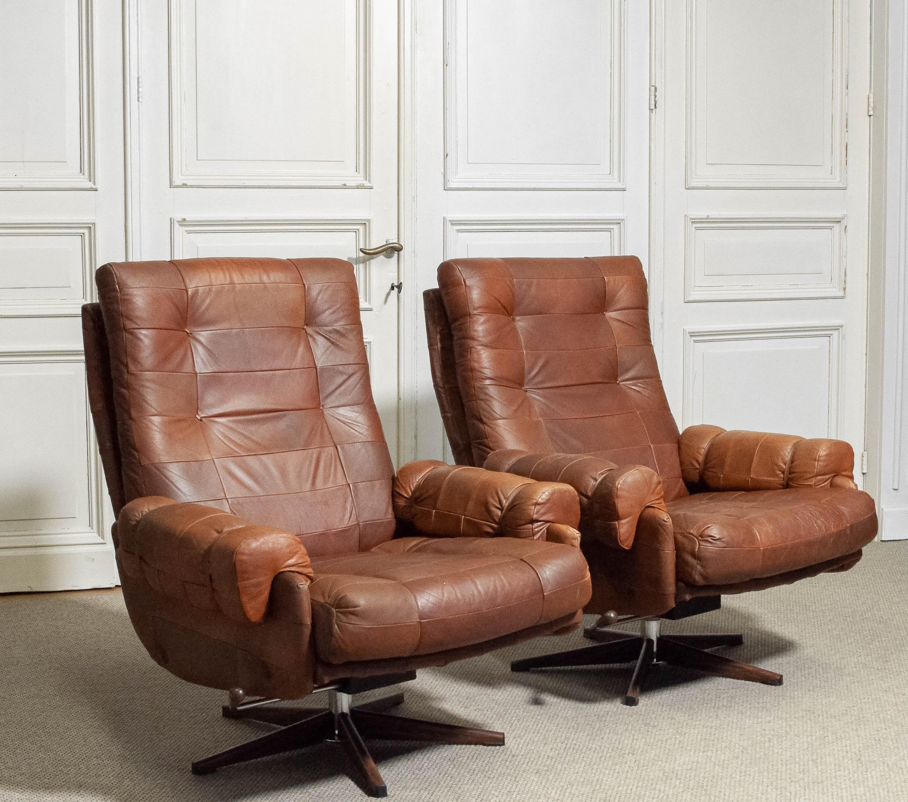 Swedish 1960s A Pair of Arne Norell Rocking and Swivel Lounge Chairs Sweden For Sale