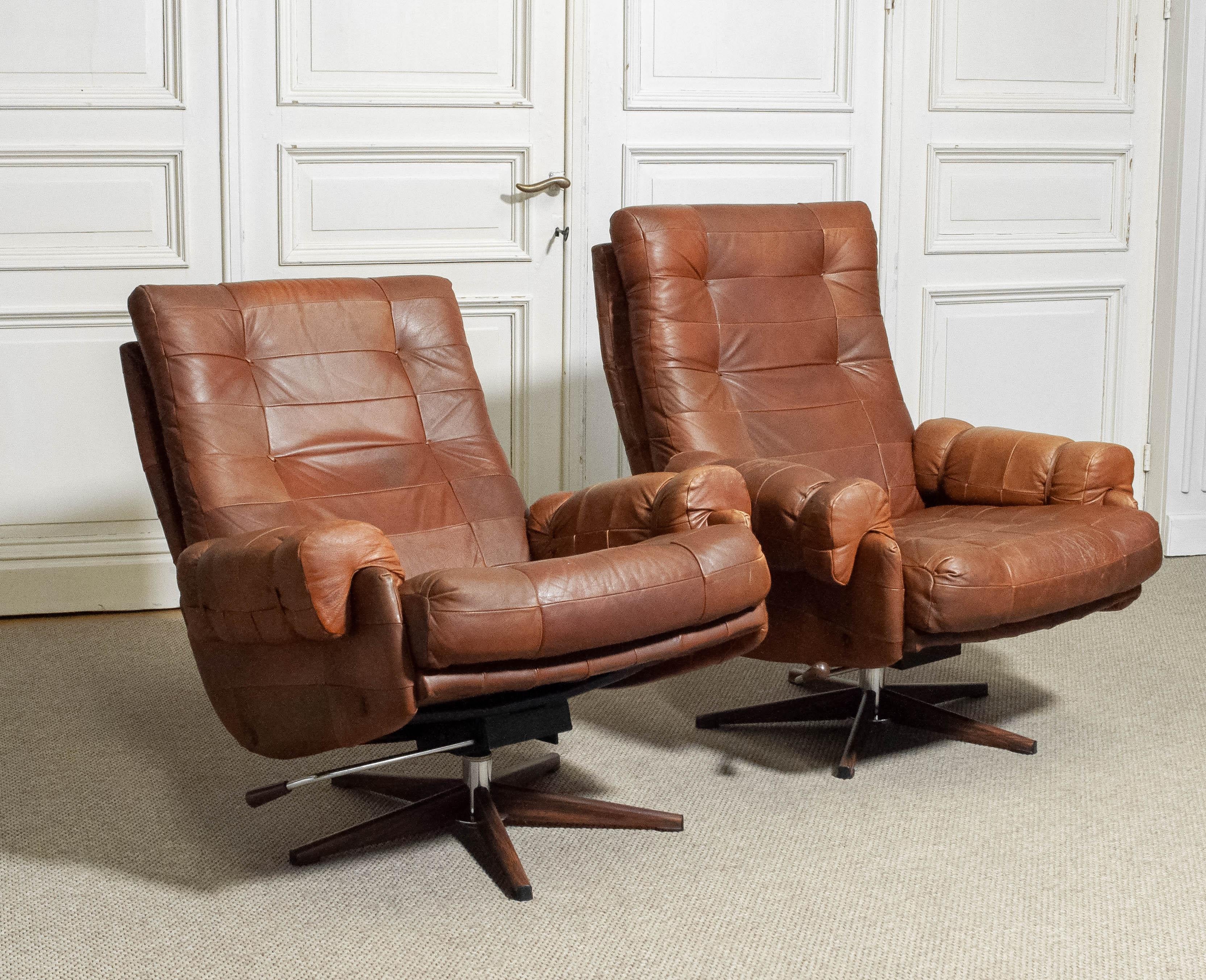 1960s A Pair of Arne Norell Rocking and Swivel Lounge Chairs Sweden In Good Condition For Sale In Silvolde, Gelderland