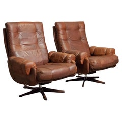 1960s Paire de chaises longues à bascule et pivotantes Arne Norells Suède