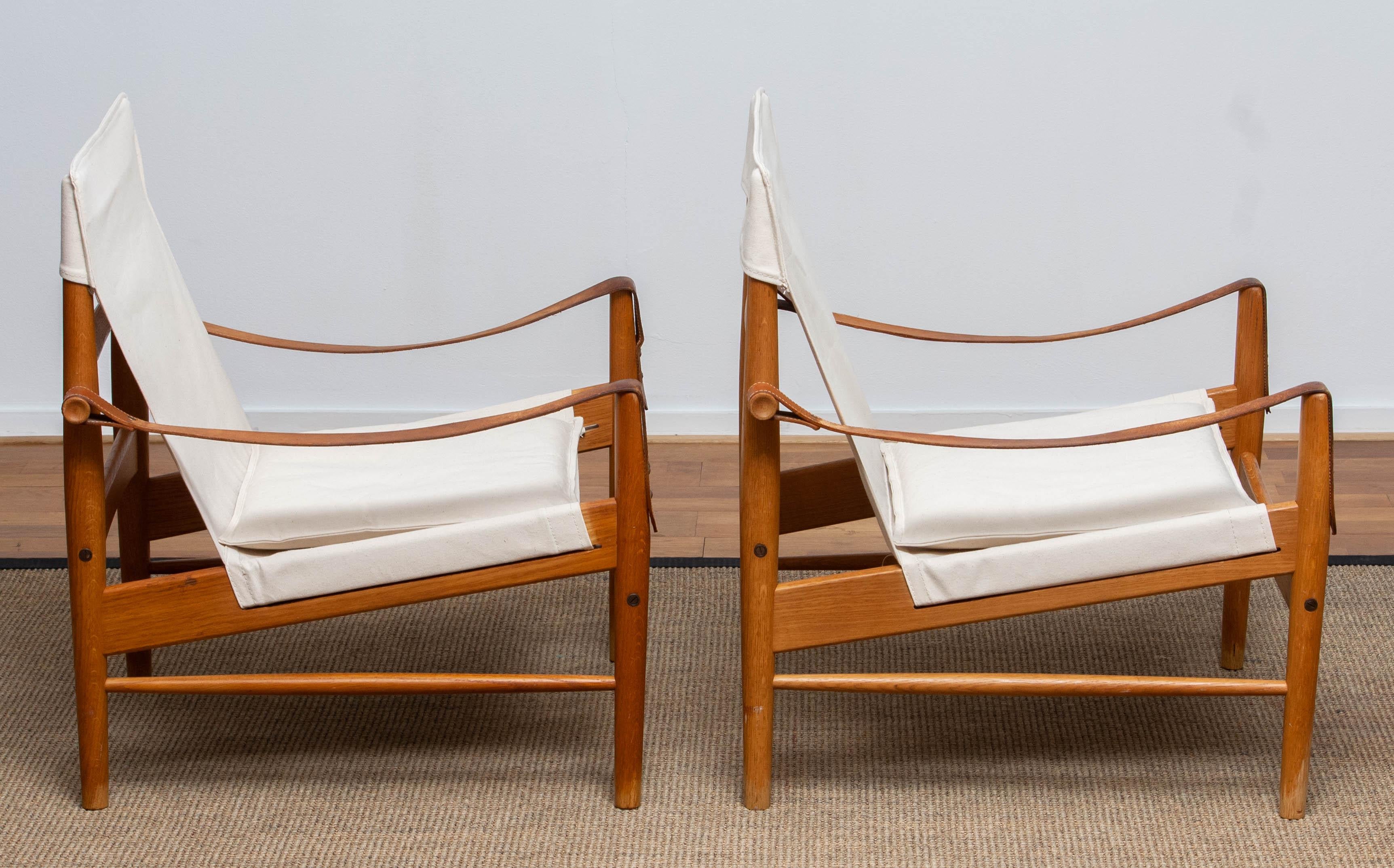 Beautiful pair of safari chairs designed by Hans Olsen for Viska Möbler in Kinna, Sweden.
These chairs are made of oak with a new canvas upholstery.
They are in a Wonderful condition and marked.
Period 1960s.
Dimensions: H.81 cm, W.73 cm, D.70