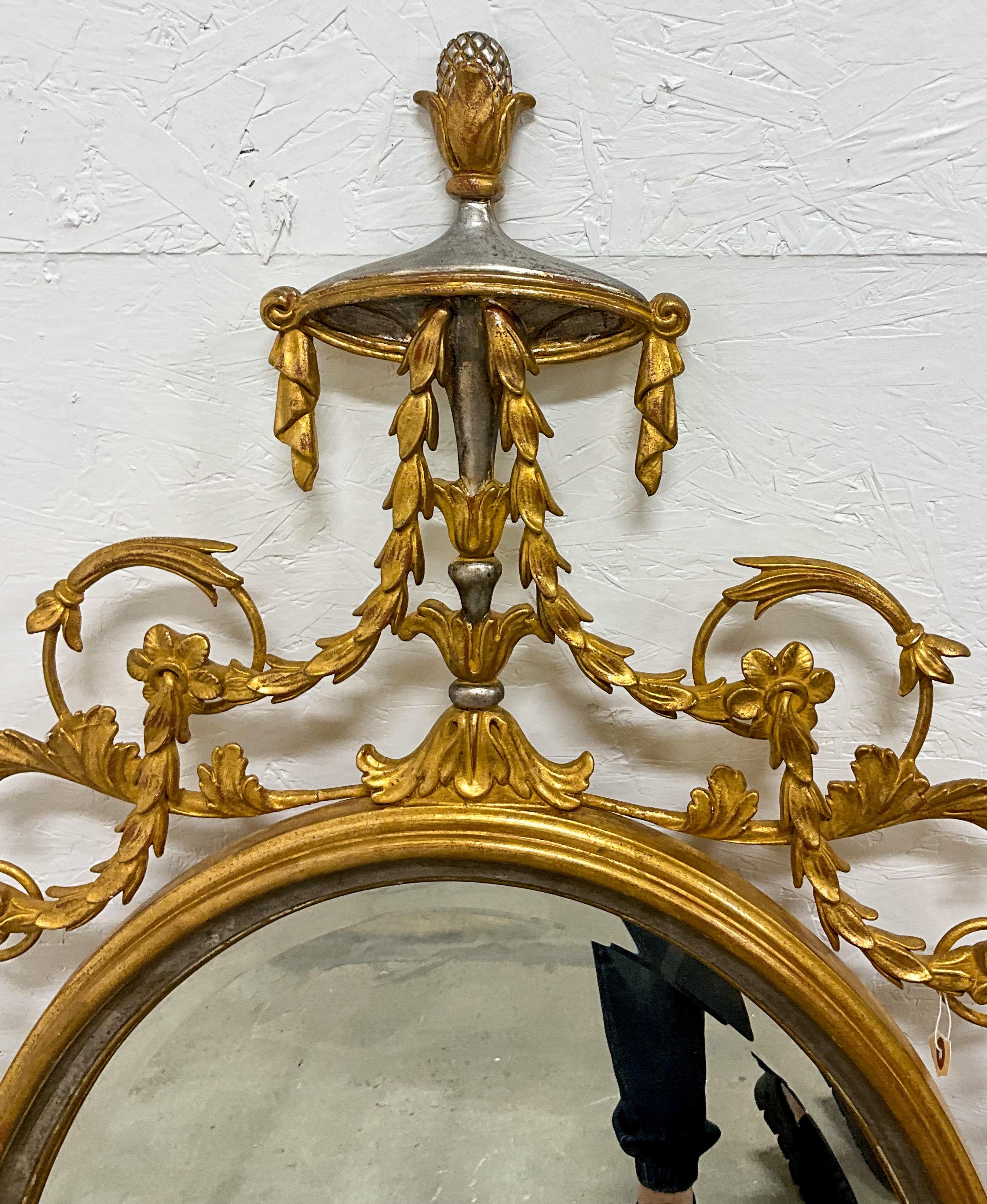 1960s Adam Style Silver / Gold Giltwood Oval Mirrors  Att. Friedman Bros, Pair In Good Condition For Sale In Kennesaw, GA