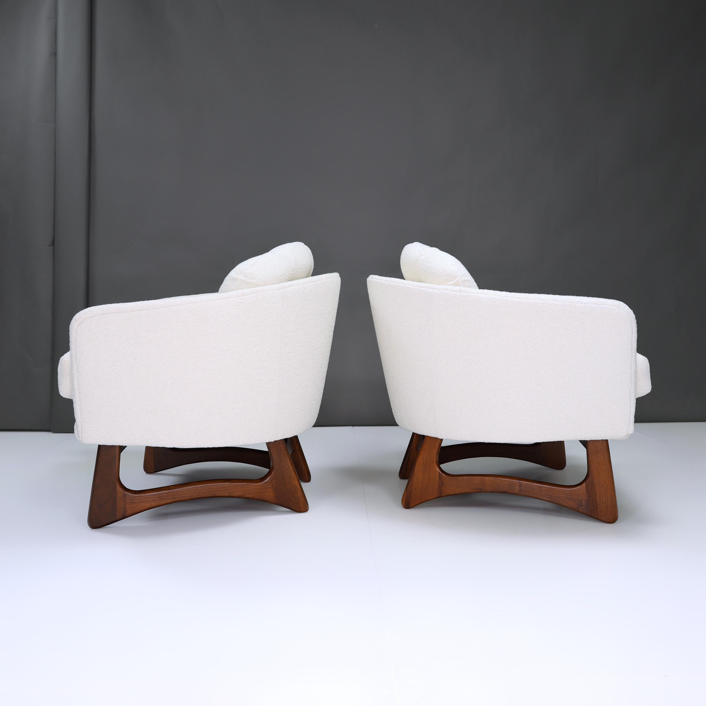 Step into the pinnacle of modern comfort with these Adrian Pearsall Barrel Back Lounge chairs, where relaxation meets style seamlessly.

These exquisite pieces offer a haven akin to lounging in a sleek, contemporary cloud, delivering unparalleled
