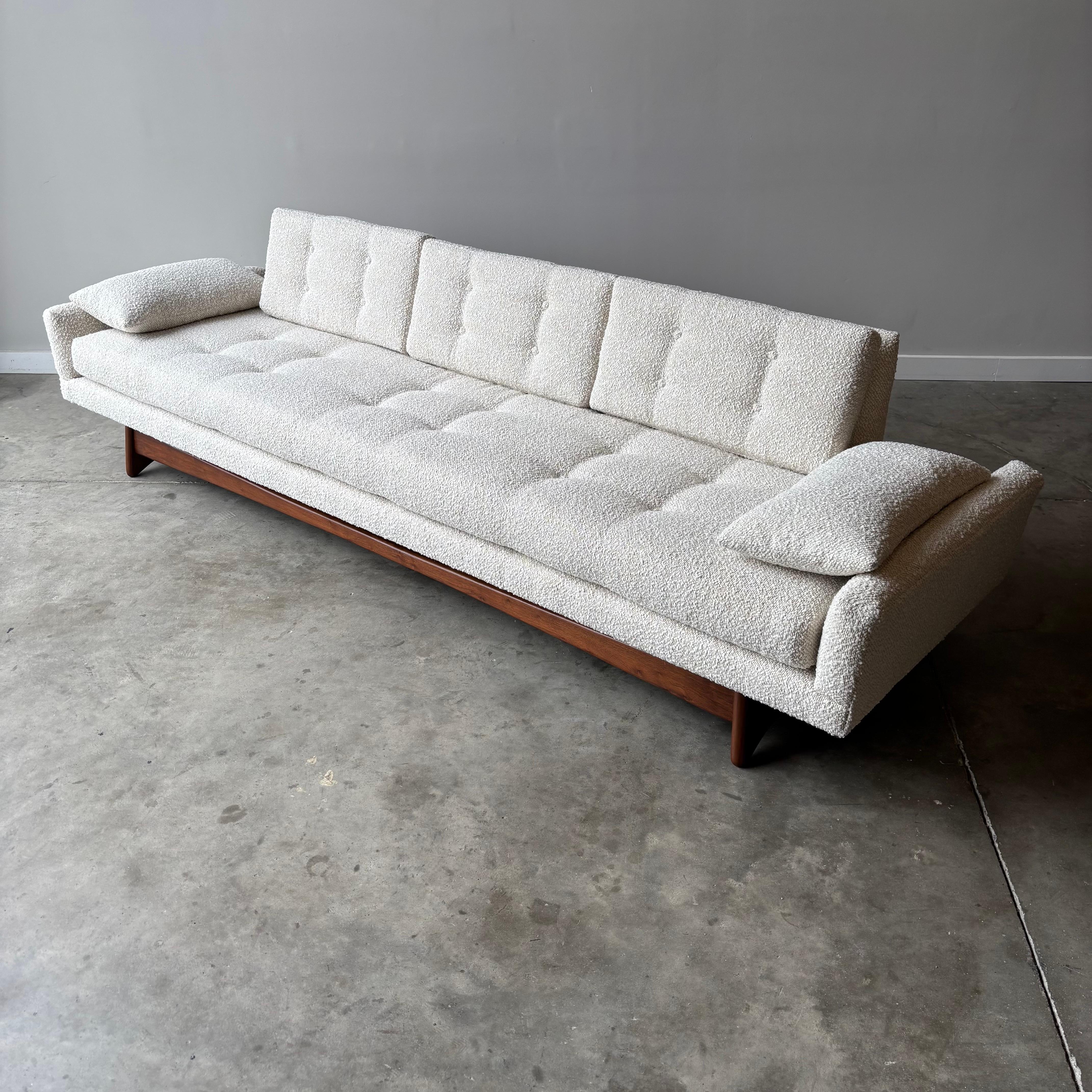 Mid-century modern design at its finest in this iconic Adrian Pearsall gondola sofa, freshly restored and ready to anchor your living space. This sculptural masterpiece showcases Pearsall's genius for combining organic forms with luxurious comfort,