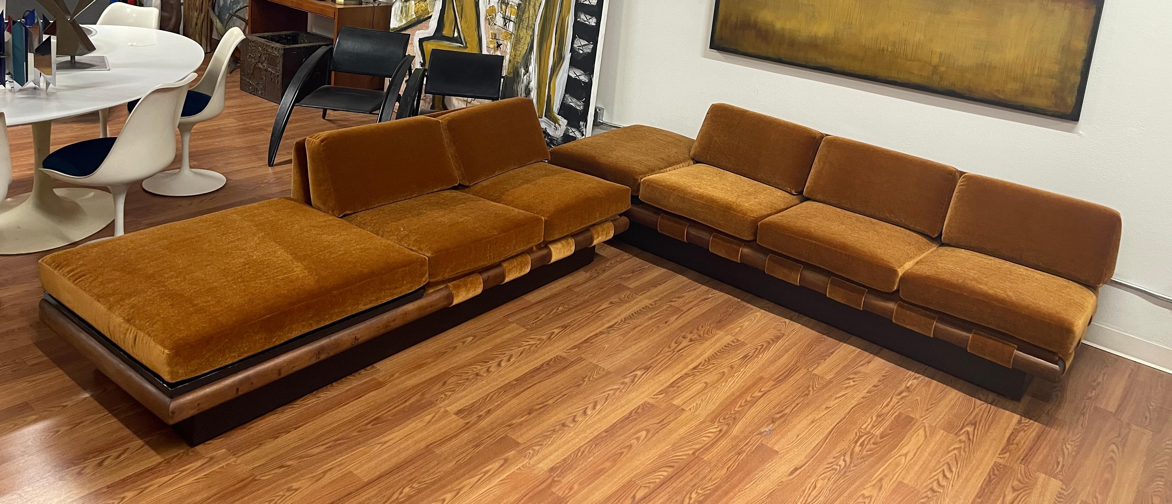 A wonderful vintage Adrian Pearsall sofa set. It features 2 sofas, a three seat and 2 seat. The ends feature beautiful slate pieces. We just had this set reupholstered in a stunning Cognac color 100% wool mohair fabric. The second picture shows the