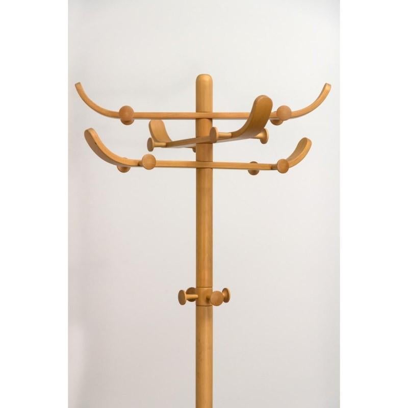 Charming coat rack designed by Søren Nissen & Ebbe Gehl for Aksel Kjersgaard. Made from solid beech, the bent arms are dotted with sixteen turned wood knobs. For maximum functionality, the three curved arms are adjustable and it is supported by a