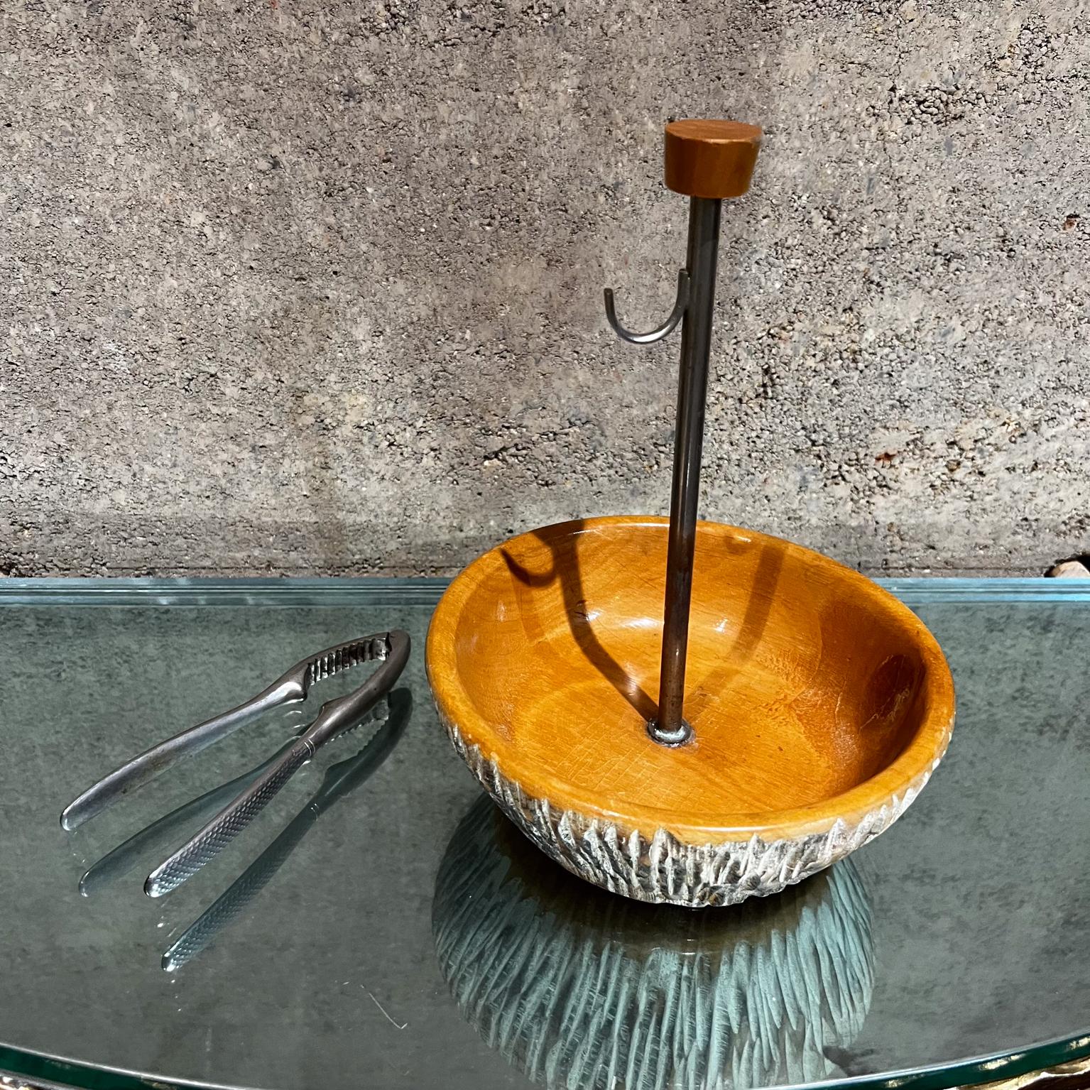 1960s Aldo Tura Sculptural Wood Bowl with Stainless Steel Nutcracker Macabo ITALY 
Bowl has a center stem with hook to place nutcracker.
8.5H x 6.63 in diameter
Maker Stamped Macabo designed by Aldo Tura
Original Unrestored Preowned Good Vintage
