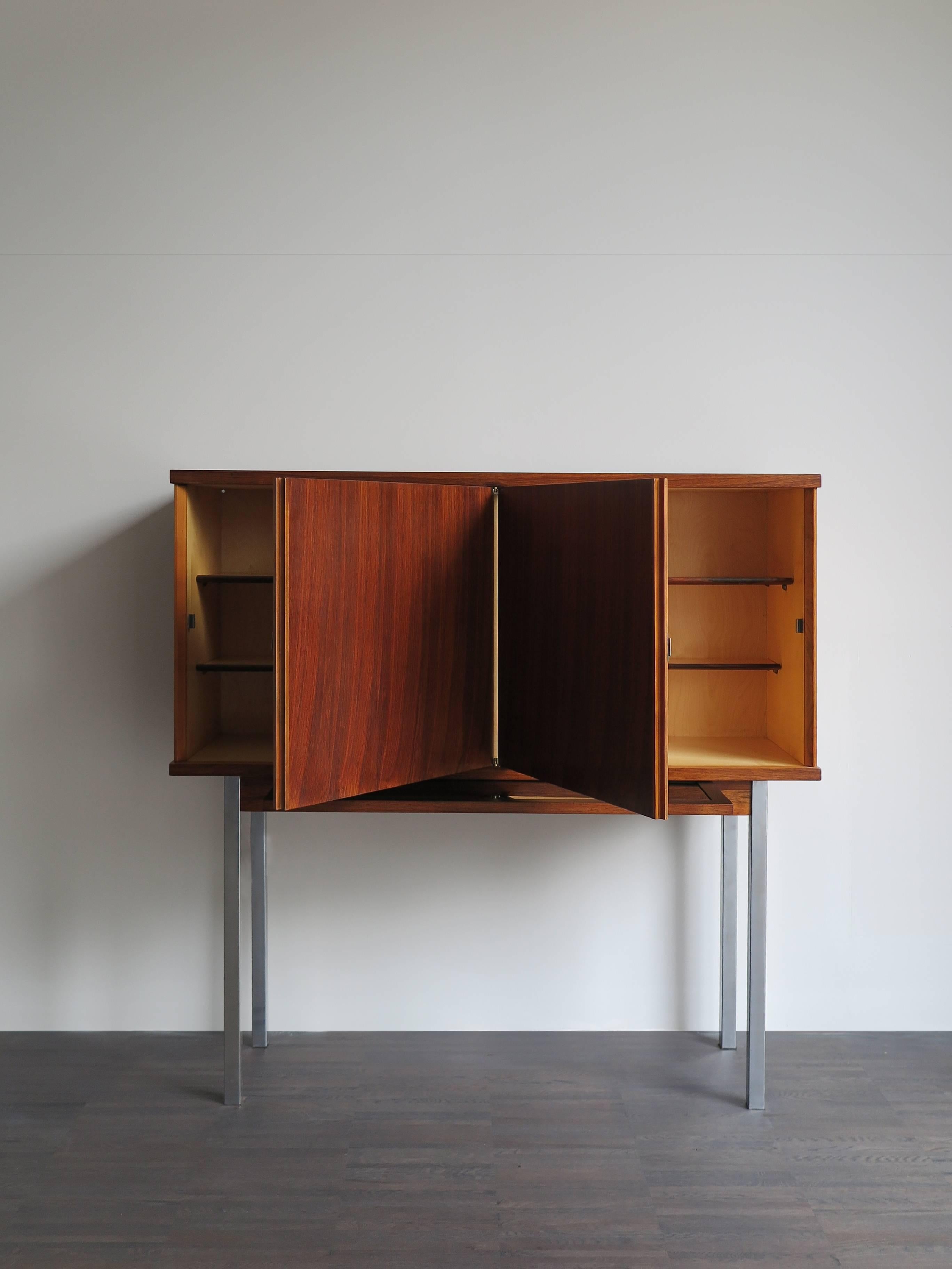 19660s Belgium rosewood buffet cabinet designed by Alfred Hendrickx with removable bottle glass holder and with metal chrome legs.