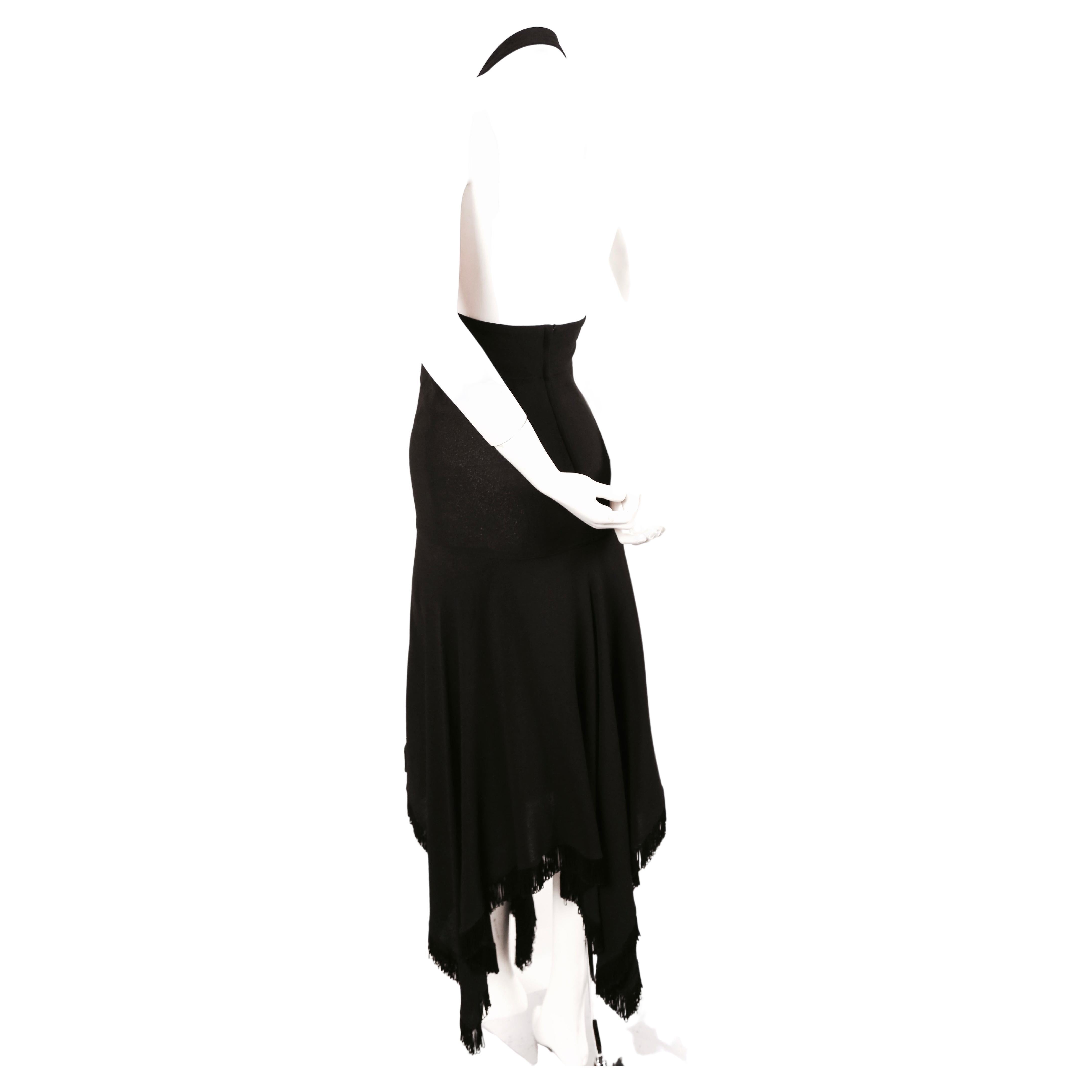 Very rare black moss crepe halter gown with handkerchief hemline and fringed trim from Alice Pollock from her Quorum boutique dating to late 1960's. Alice established her Quorum boutique in 1964 and began her collaboration with Ossie Clark and Celia