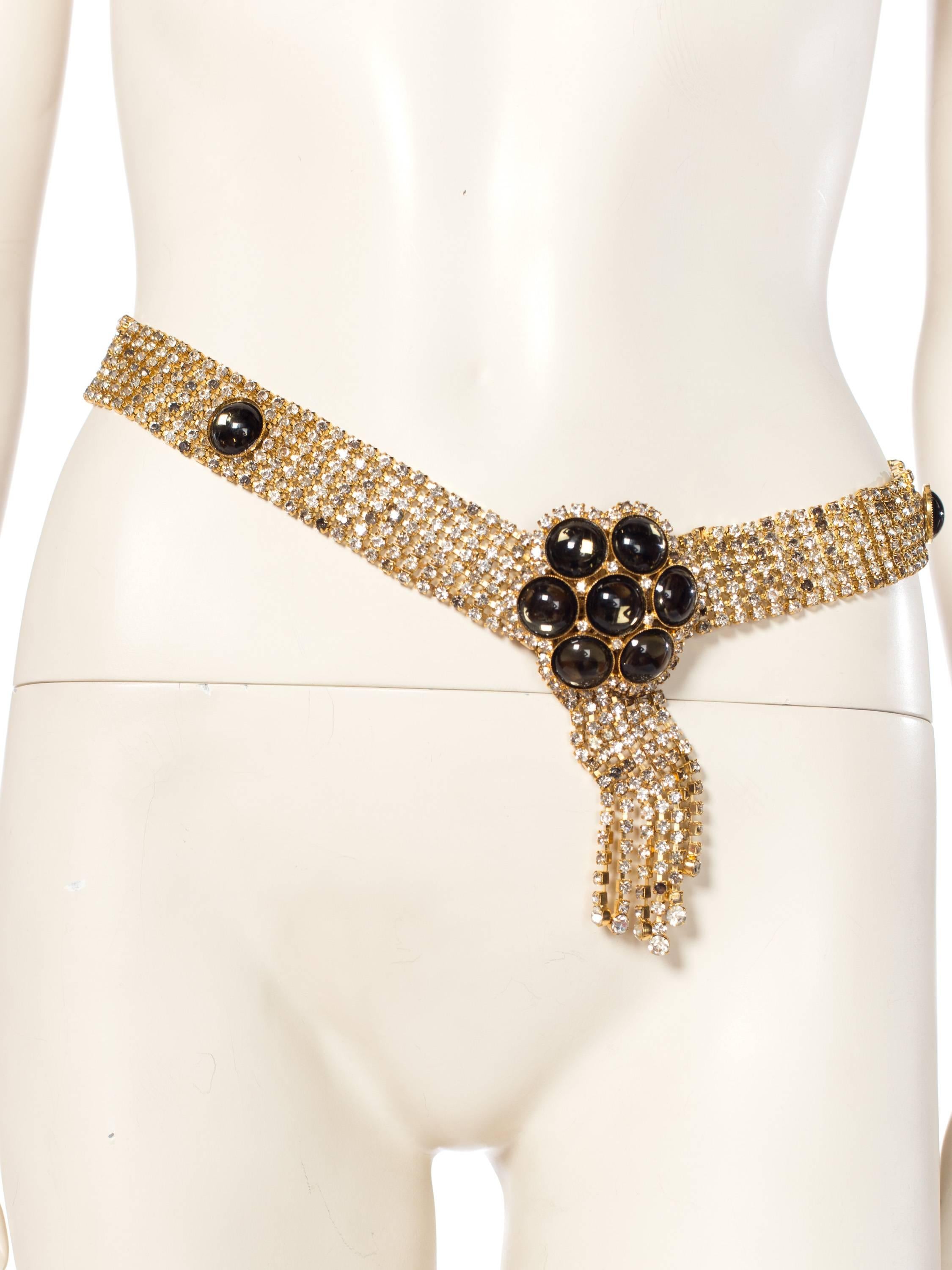 Gorgeous hand worked belt with three adjustable sizes, a rare and glamorous piece from the 1960s. 