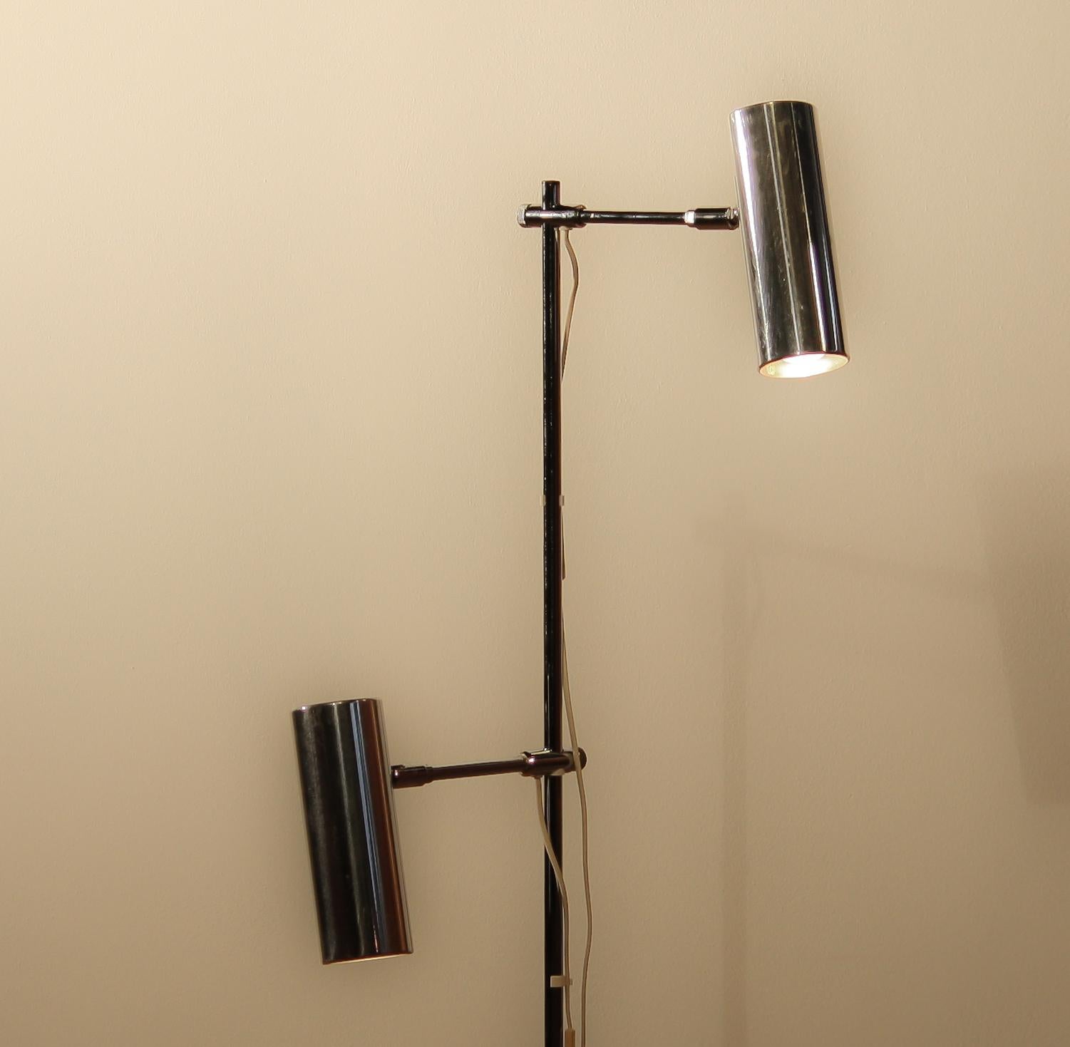 Beautiful floor lamp made by Bergboms Scan light AB Sweden.
This lamp has two lights.
The lampshades are made of aluminium and the stand is made of chromed steel.
It is in a nice working condition.
Period 1960s
Dimensions: H. 112 cm ø 23