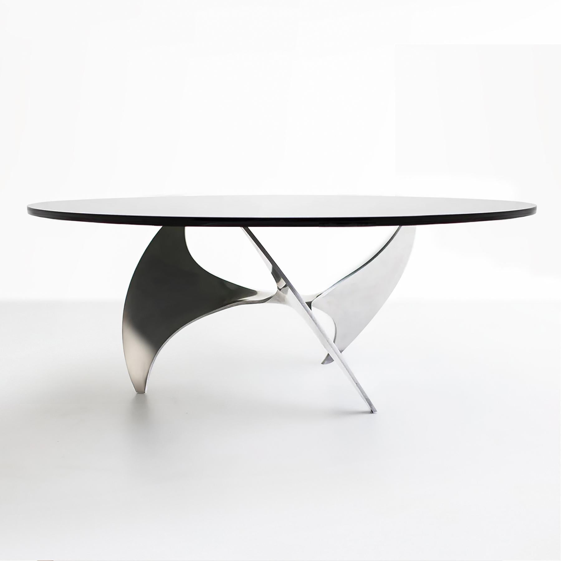 Vintage 1960s Aluminium and Glass Coffee ‘Propeller’ Table by Knut Hesterberg for Ronald Schmitt with the original thick glass 110cm diameter top.

This eye catching Mid Century Modern glass and Aluminium base coffee table was designed by Knut