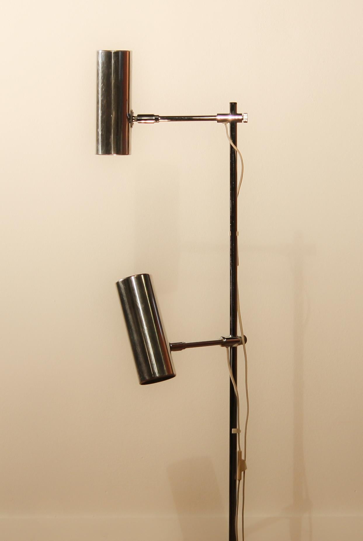 Beautiful floor lamp made by Bergboms scan light AB, Sweden.
This lamp has two-light.
The lampshades are made of aluminum and the stand is made of chromed steel.
It is in a nice working condition.
Period: 1960s.
Dimensions: H 112 cm, ø 23