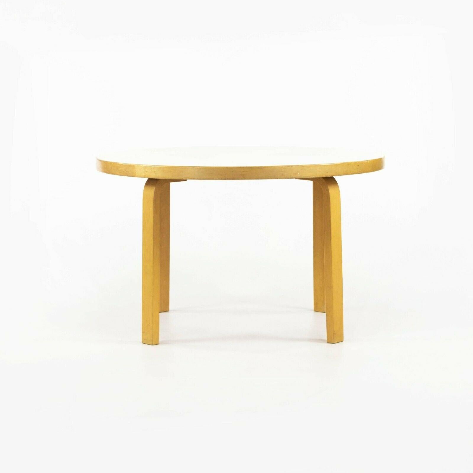 Listed for sale is a rare L-Leg Children's table, designed by Aino and Alvar Aalto, produced by Artek. The table retains an original label from Scandinavian Designs in New York, a showroom that was well known for selling sought after Scandinavian