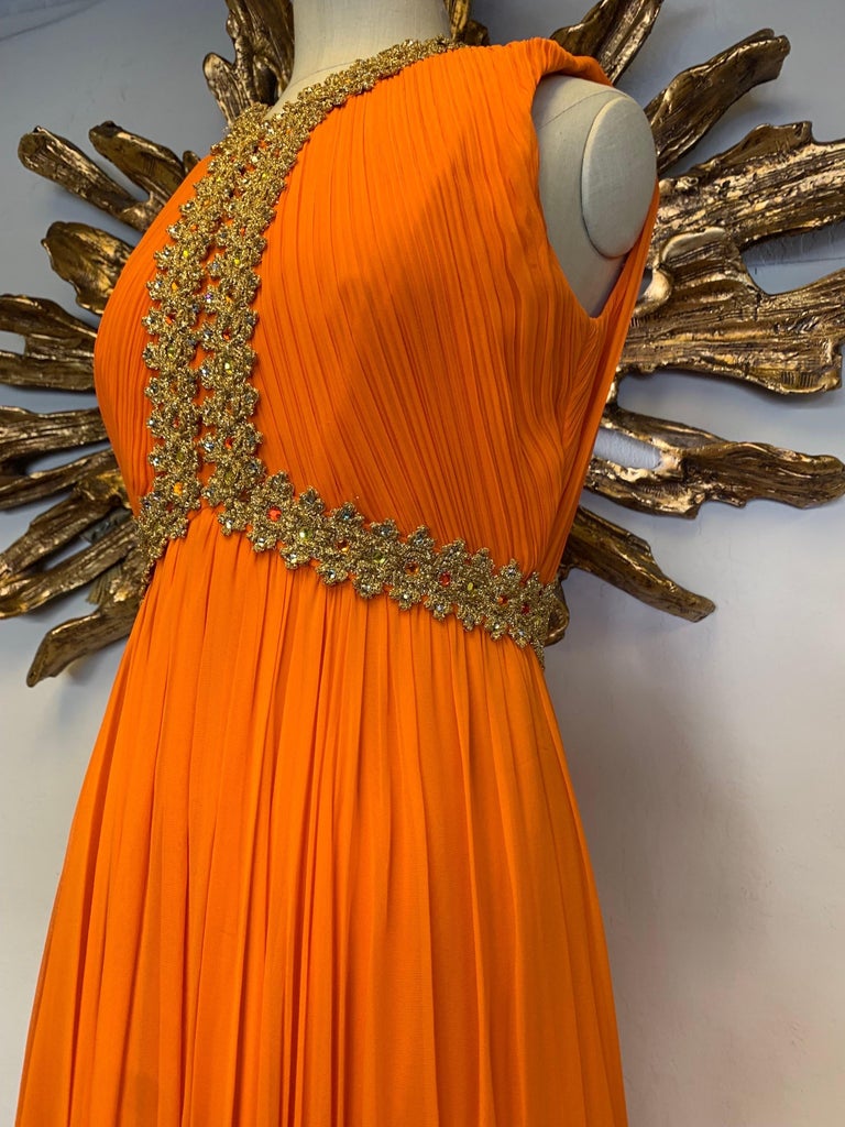 Women's 1960s Amen Wardy Orange Knife-Pleated Goddess Gown with Jeweled Neckline & Waist For Sale