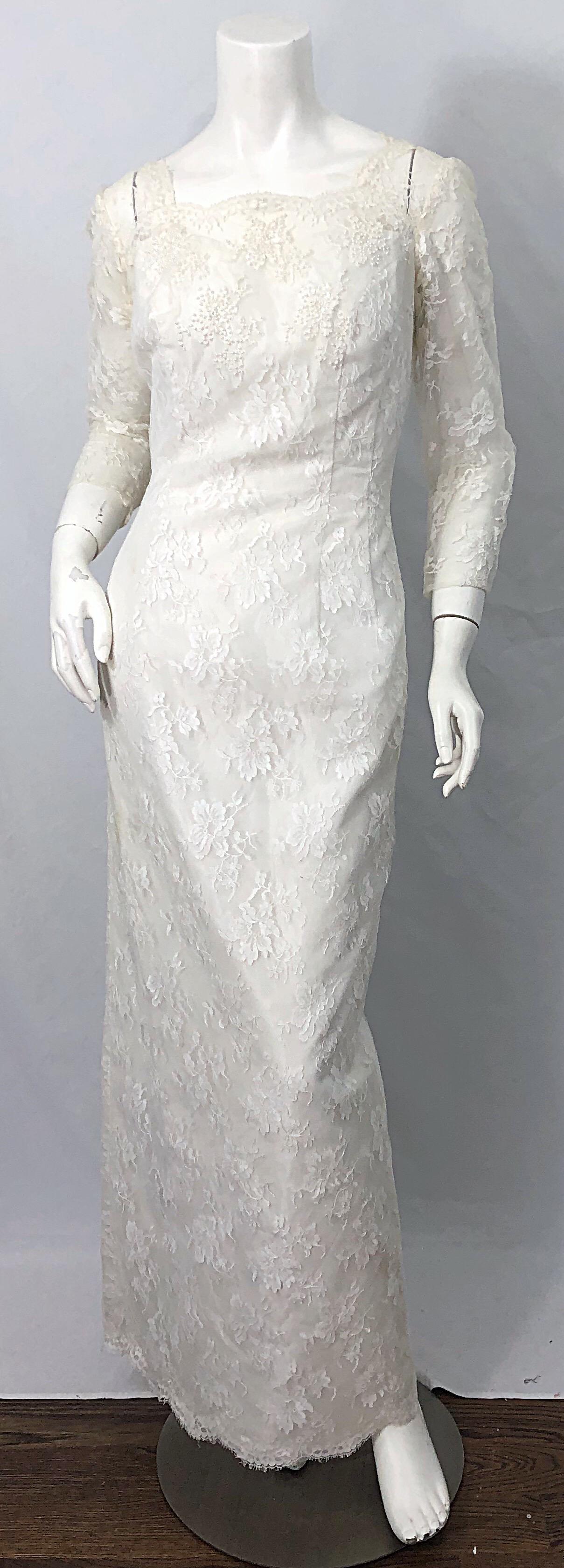 Beautiful early 60s AN ORIGINAL BY CONSTANTINO white beaded, sequin, pearl long sleeve silk lace wedding dress ! Couture quality, with so much attention to details. Silk taffeta with white French lace overlay. Thousands of hand-sewn beads and