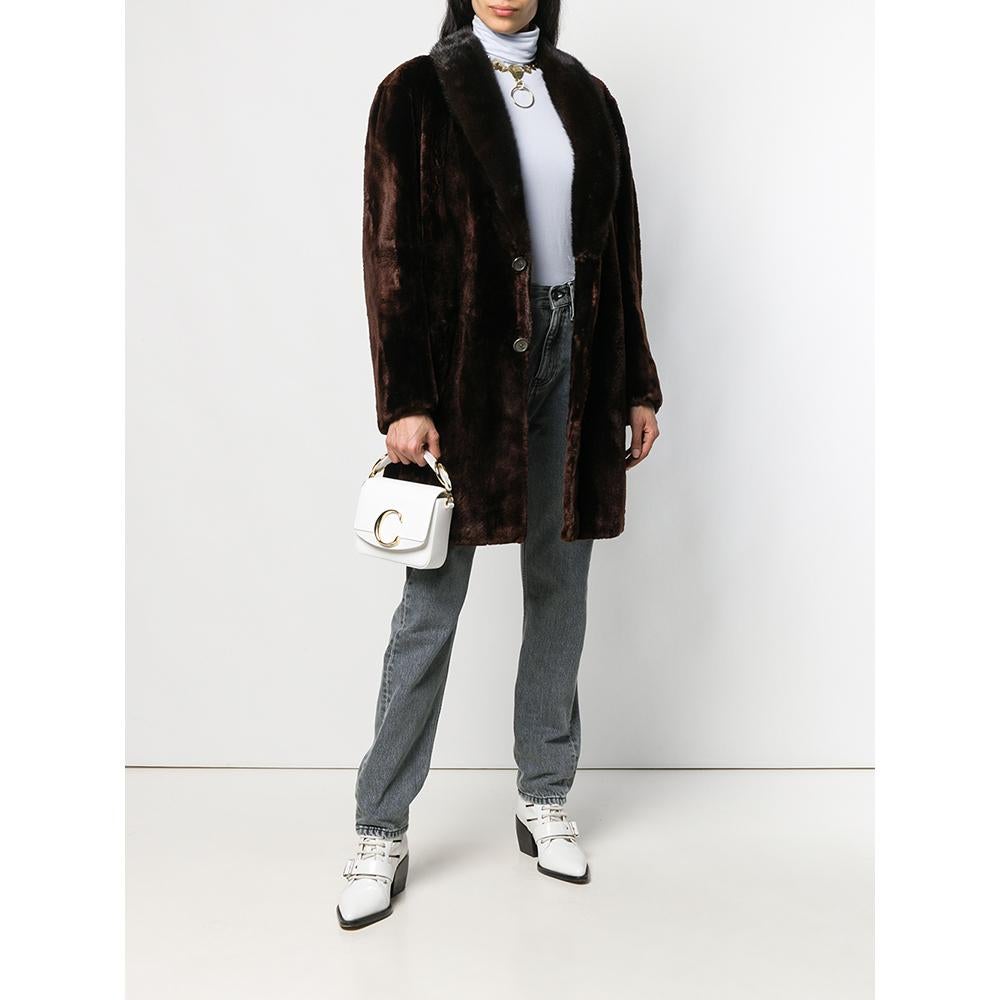 A.N.G.E.L.O. Vintage - ITALY

A.N.G.E.L.O. Vintage Cult brown beaver and otter fur coat. V-shaped shawl collar, front button closure. Long sleeves and front welt pockets.

Please note, this item cannot be shipped outside the European Union.

Years: