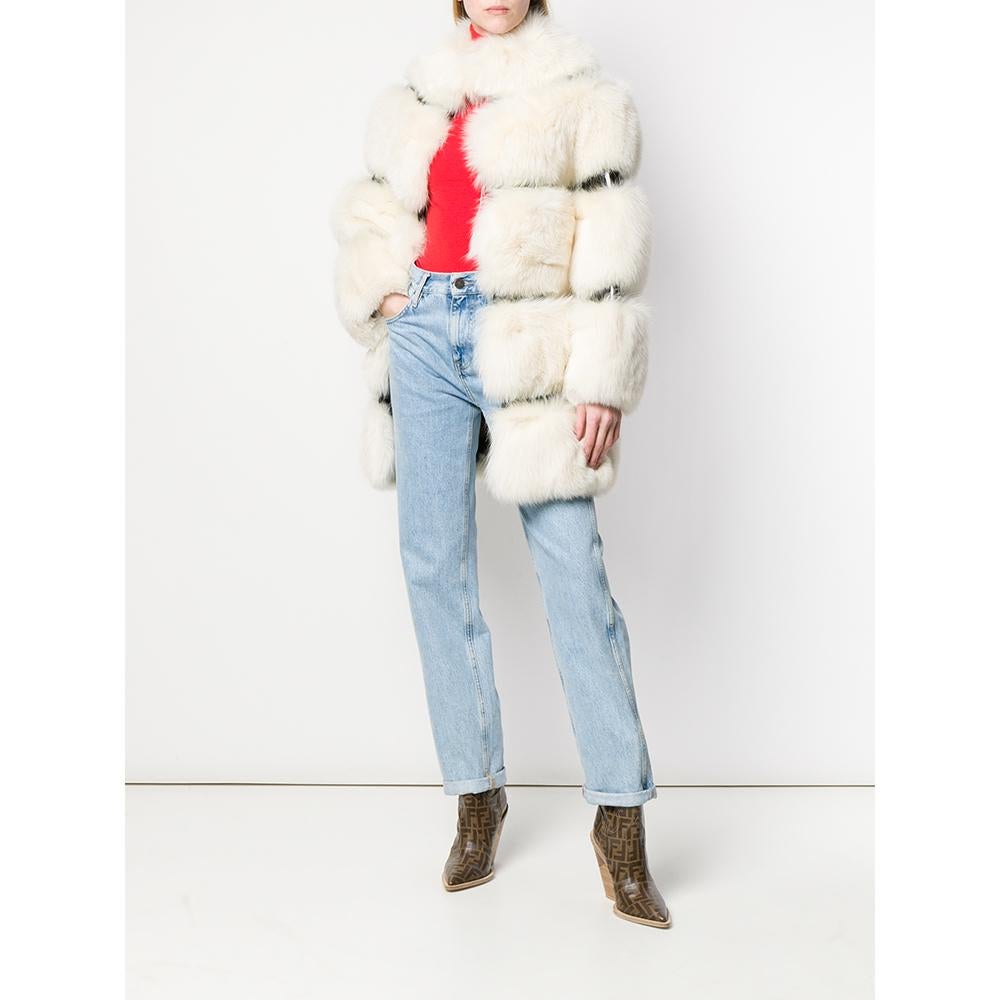 A.N.G.E.L.O. Vintage Cult white fox fur with brown vinyl base. Concealed hook closure. Raised fur collar. Lined. 

Please note, this item cannot be shipped outside the European Union.

Years: 60s

Made in Italy

Size: 42 IT

Flat