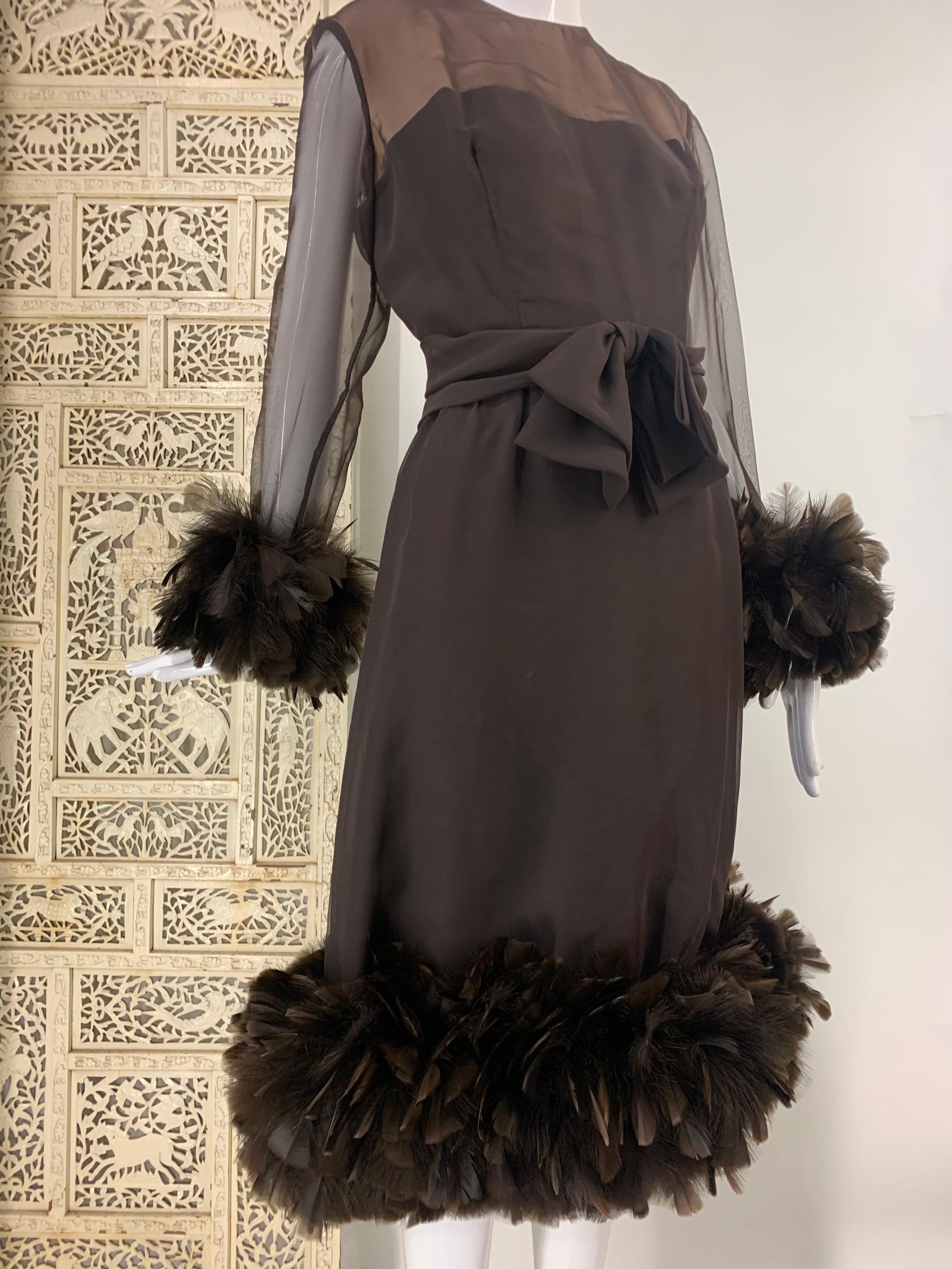 1960s Anita Modes Chocolate Chiffon and Crepe Dress w Turkey Feather Trim: Fashioned for tall girls, lined décolletage with a full flourished bow at front waist. Flirty chocolate brown turkey feather cuffs and hem.  Full back zipper.  US size 8-10