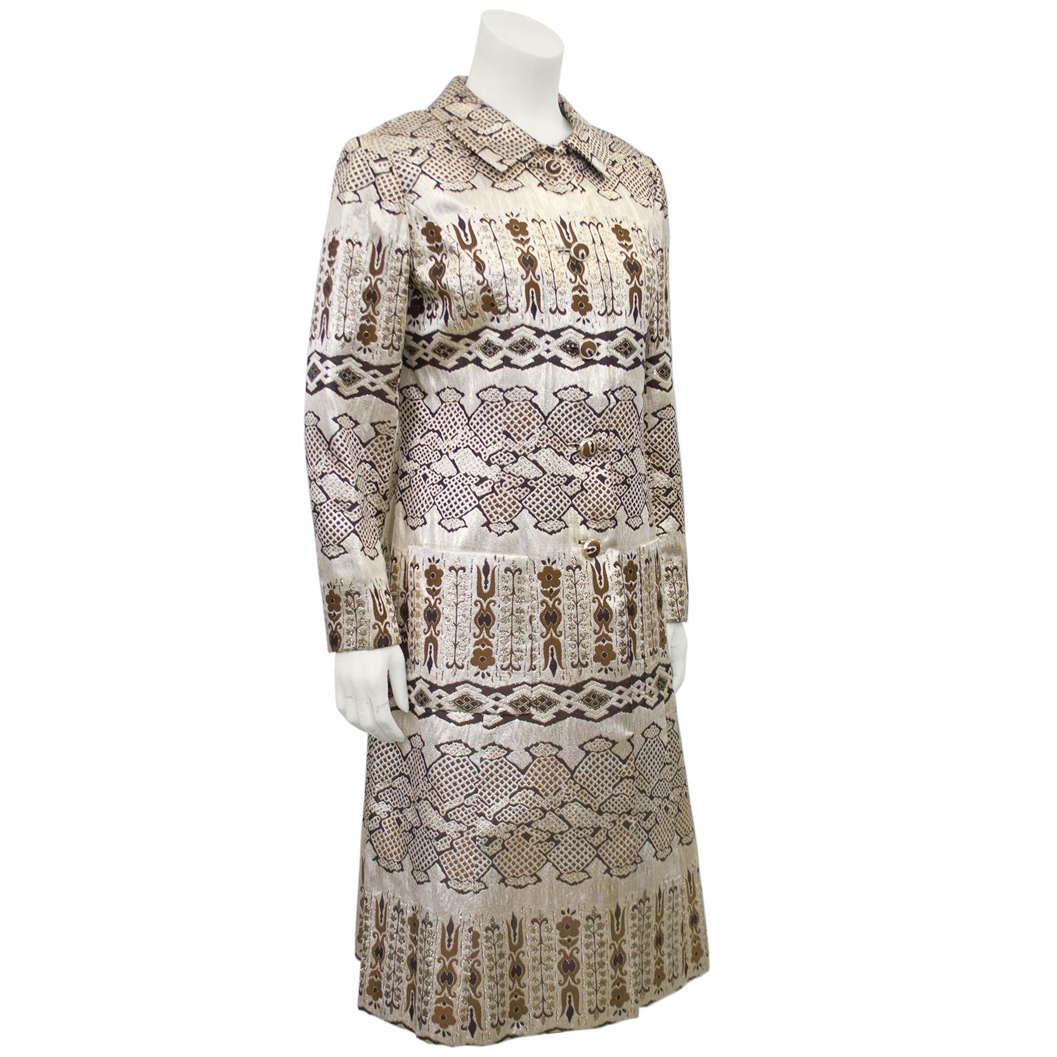 Beautiful bronze and gold brocade coat from the 1960s. The label says, 