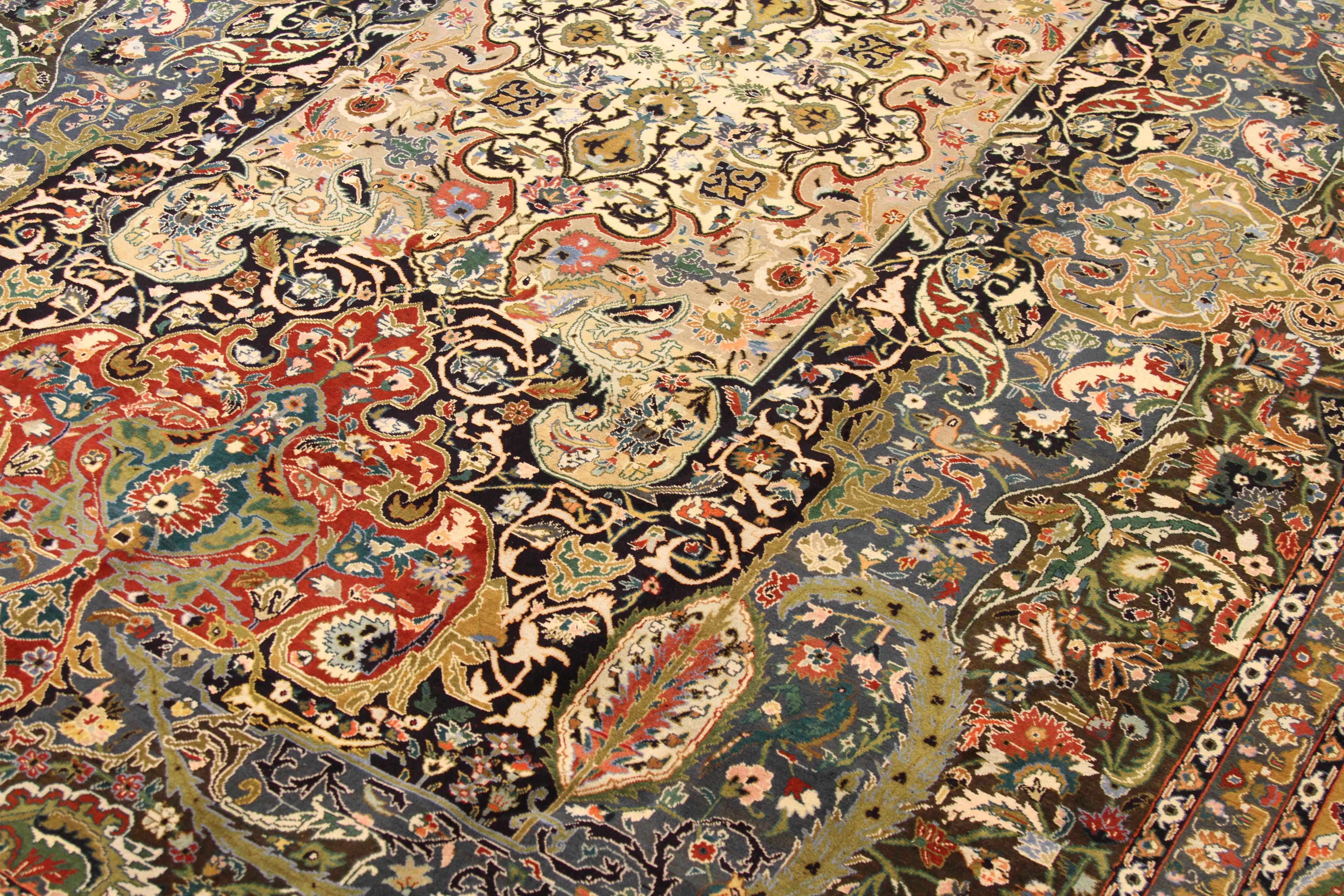Antique Persian rug handmade in the 1960s. Weavers used Fine and exquisite wool colored with rich all-organic vegetable dyes. It follows a traditional style rooted in the Classic designs of world-famous Safavid carpets which were created in many