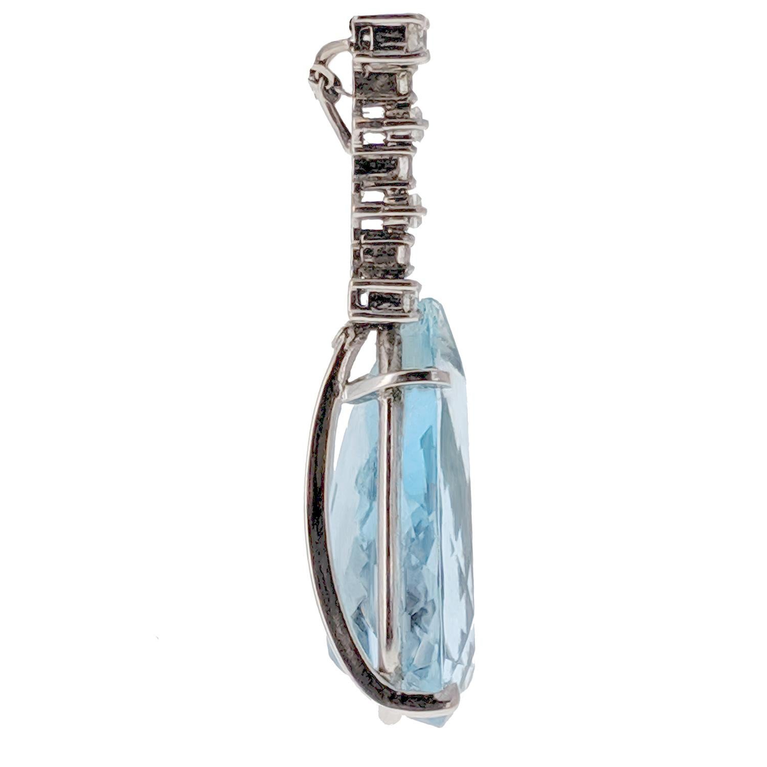 Suspending a pear-shaped aquamarine, of approximately 18 carats and topped with round-cut and baguette-cut diamond element. Mounted in 18k white gold, with maker's mark 