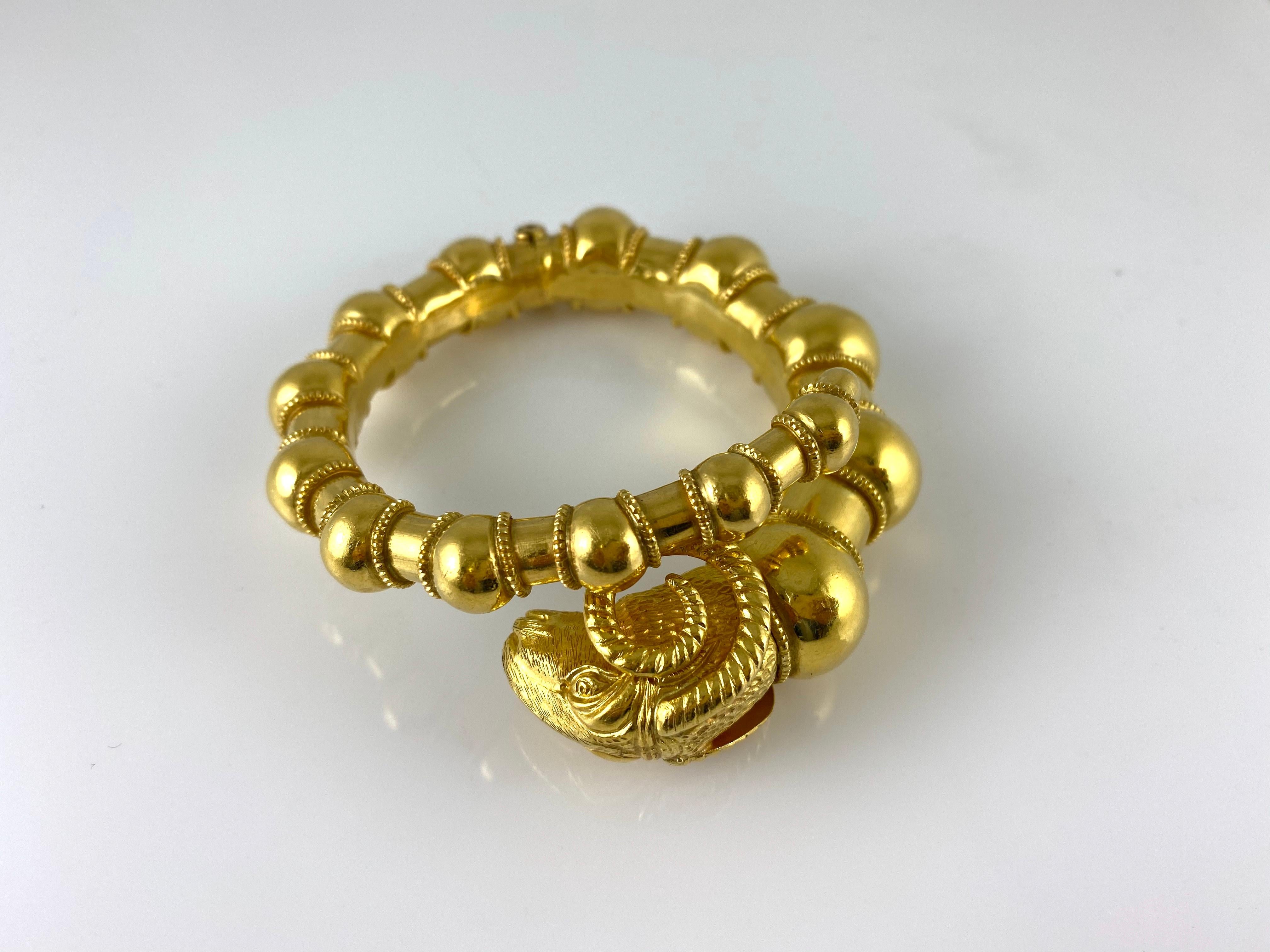The bracelet is finely crafted in 18k yellow gold and weighing approximately total of 55.00 DWT.
Circa 1960.
