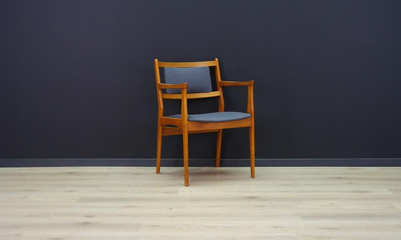 A unique armchair from the 1960s-1970s, a beautiful Minimalist form with amazing armrests. Teak construction covered with a new fabric. Preserved in good condition (small dings and scratches on wooden structure), directly for use.

Dimensions: