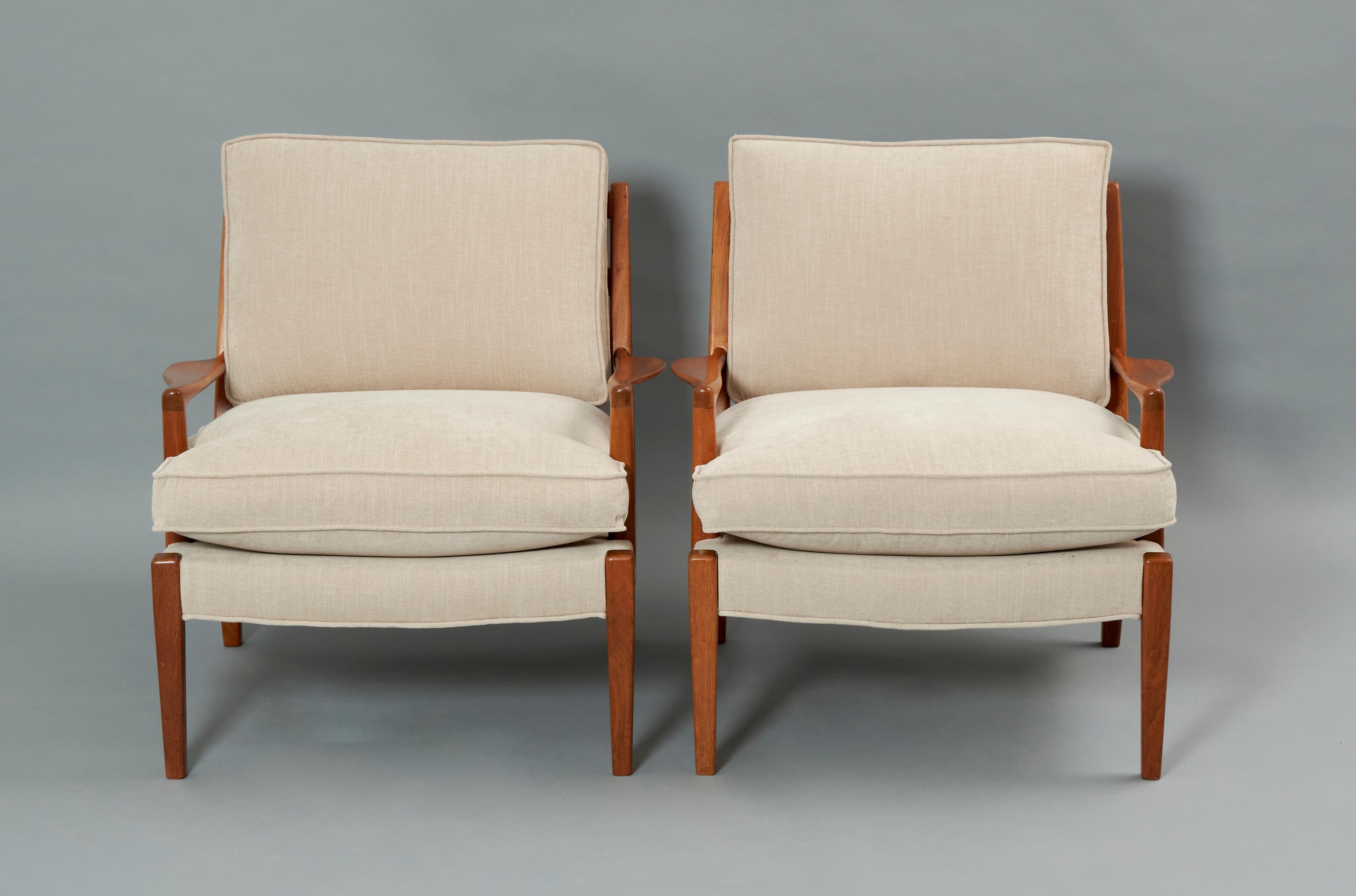 Arne Norell ‘’Löven’’ armchairs in walnut and upholstery. Restored wood with patina and renewed upholstery in grey. Sweden 1960s 
Arne Norell was a Swedish designer founder of the homonymous company Møbel AB Arne Norell. Disciple of Kaare Klimt,